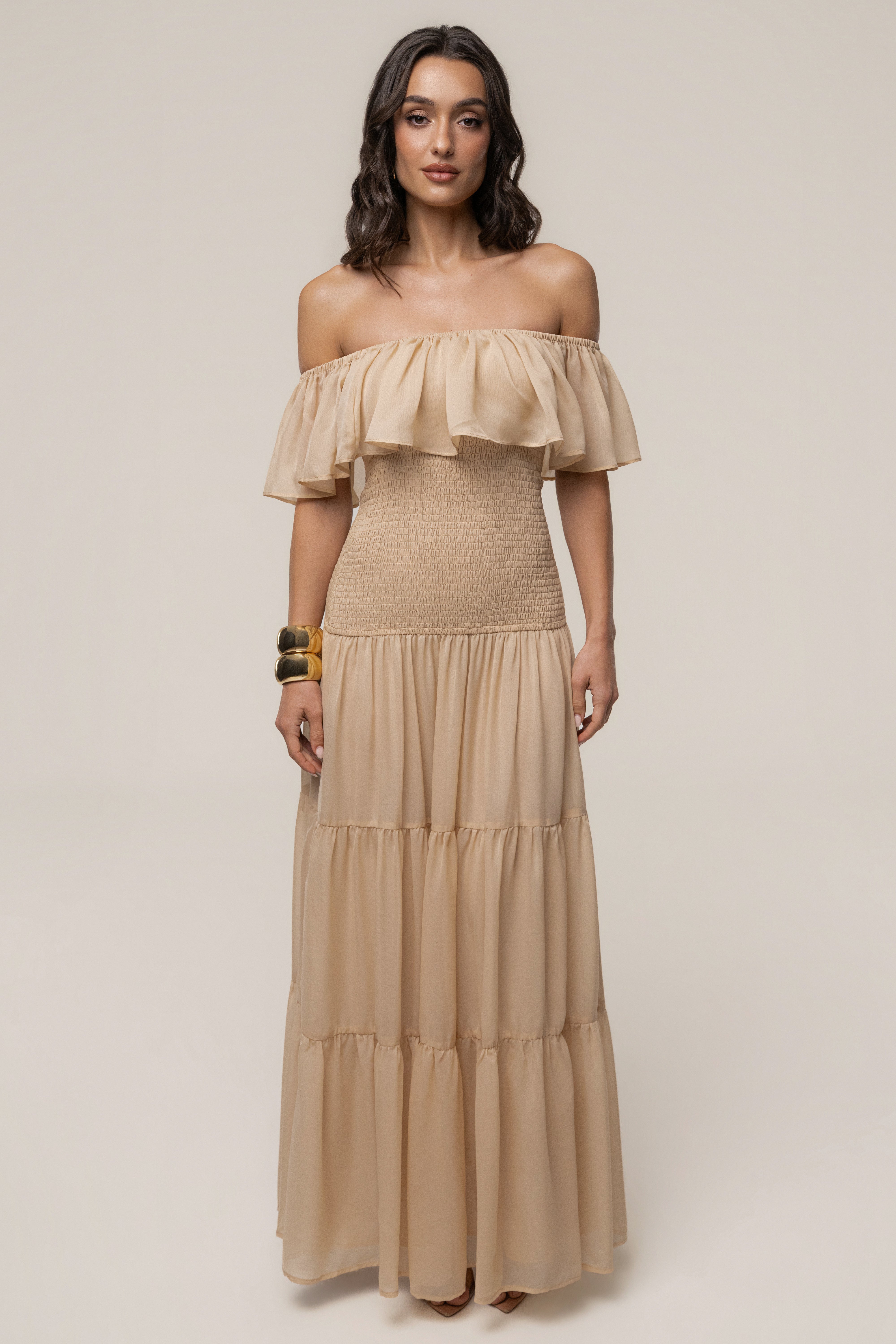 JLUXLABEL Sand Seaside Drift Maxi Dress displayed on a model, featuring a flowy fabric and beach-inspired design.