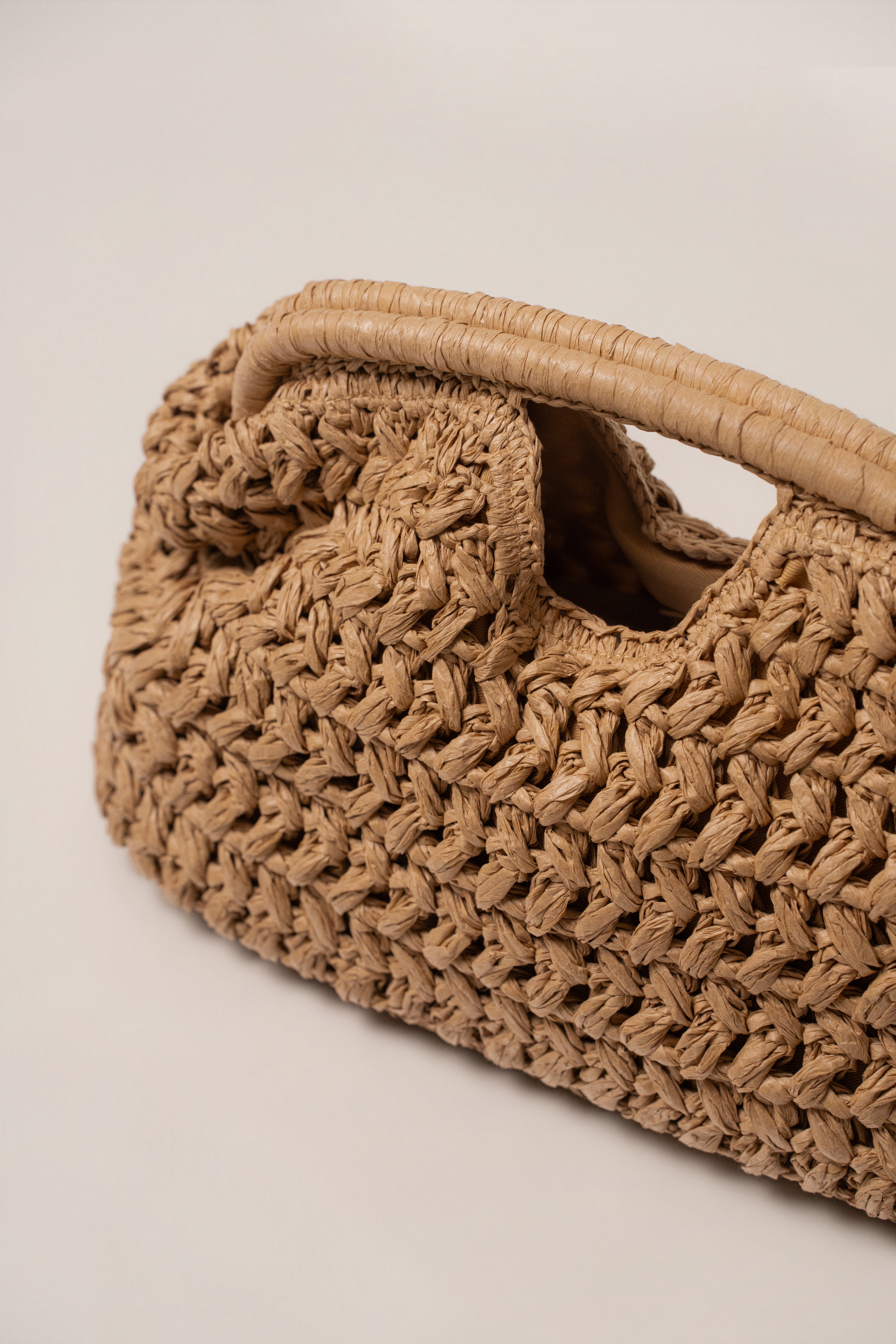 Natural Casa Sol straw bag by JLUXLABEL, woven accessory with handles, perfect for casual summer outfits.