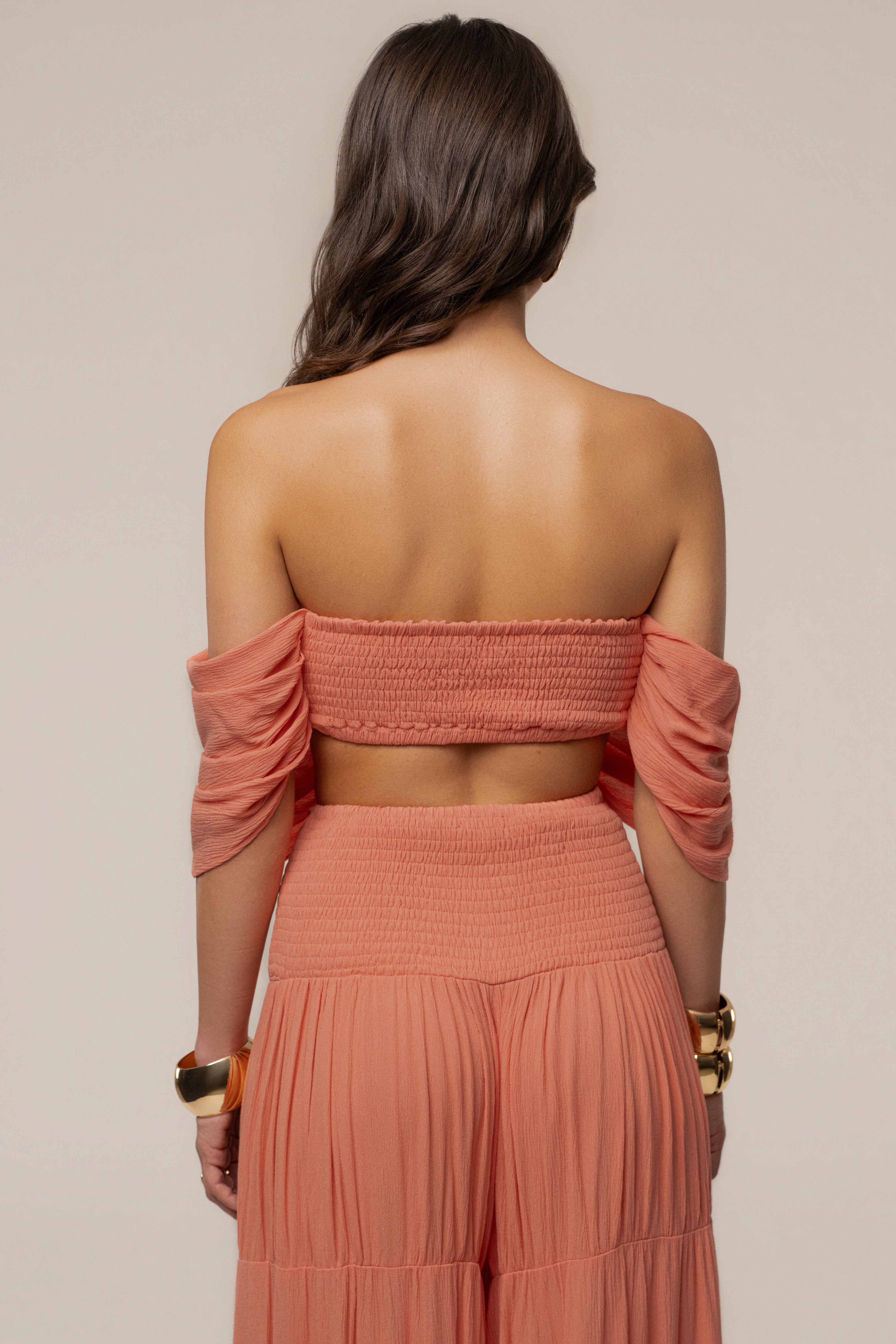 Peach JLUXLABEL Hidden Gems tier pant set featuring layered wide-leg pants and a matching top, stylish and comfortable for casual wear.