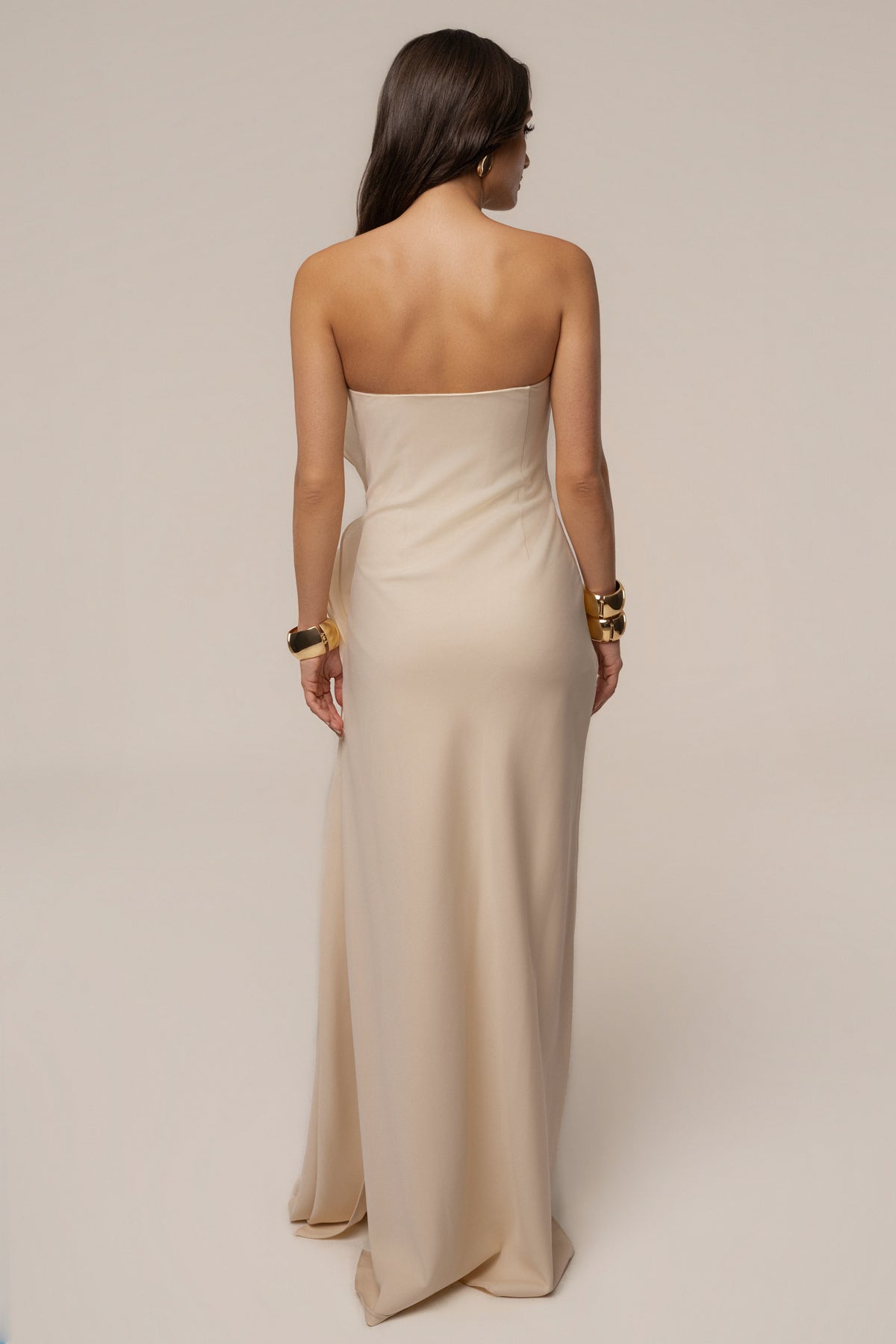 Ivory Main Event maxi dress by JLUXLABEL featuring a flowy silhouette and elegant design, shown on a model.
