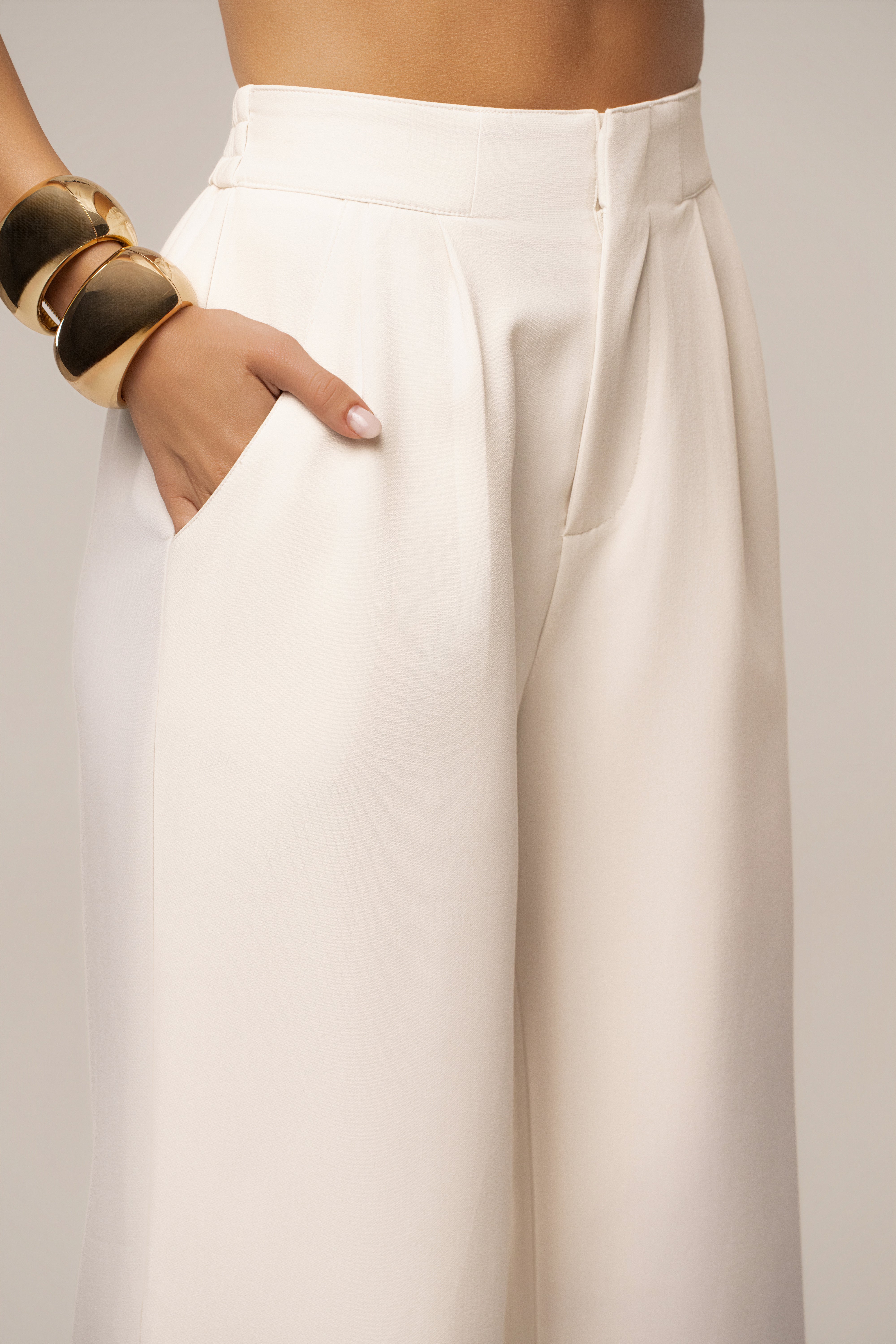 Ivory tailored trousers from JLUXLABEL, stylish bottoms with a sleek fit and classic design, perfect for sophisticated outfits.