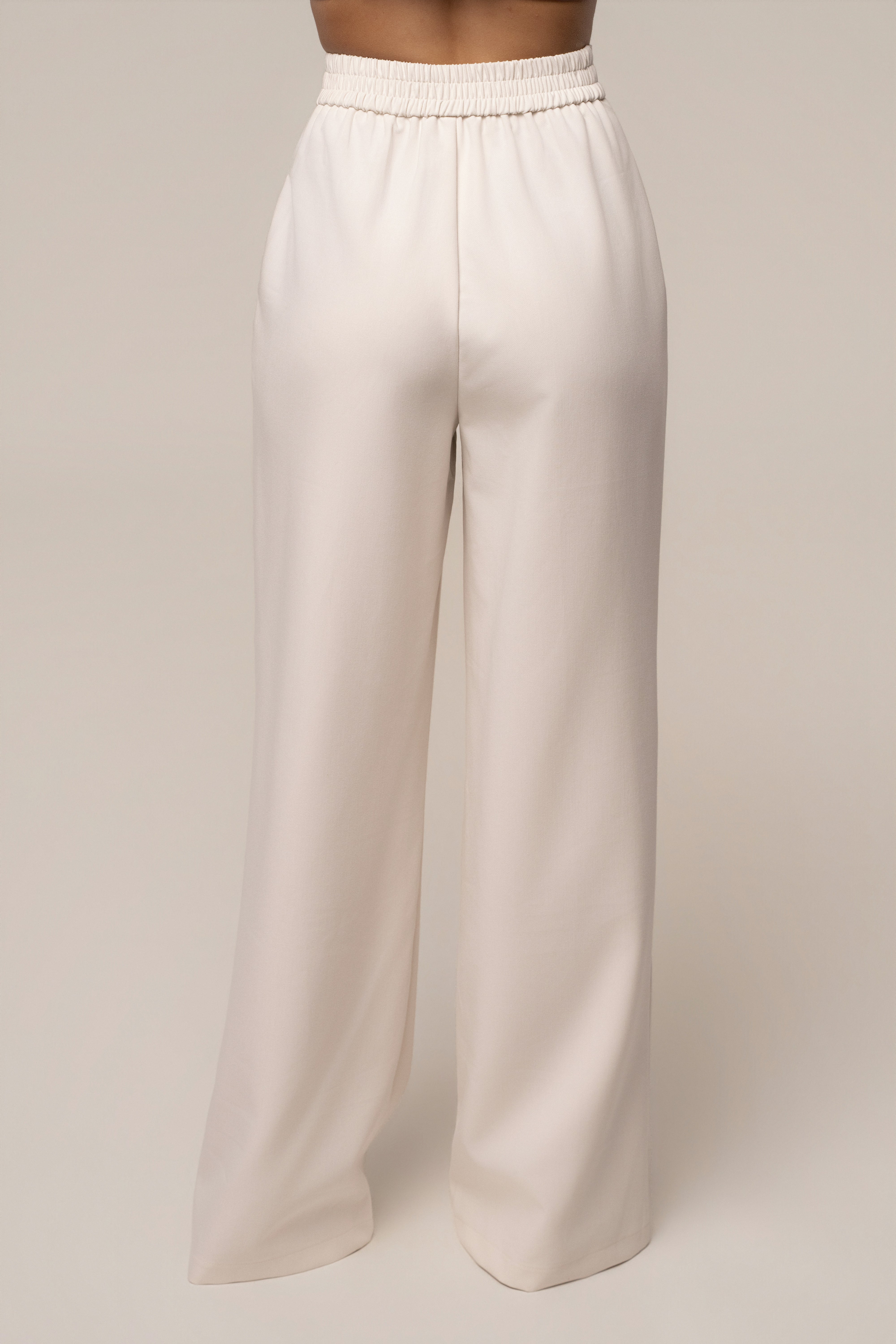 Ivory JLUXLABEL tailored trousers for women, stylish bottoms with a sleek, fitted design perfect for professional or casual wear.