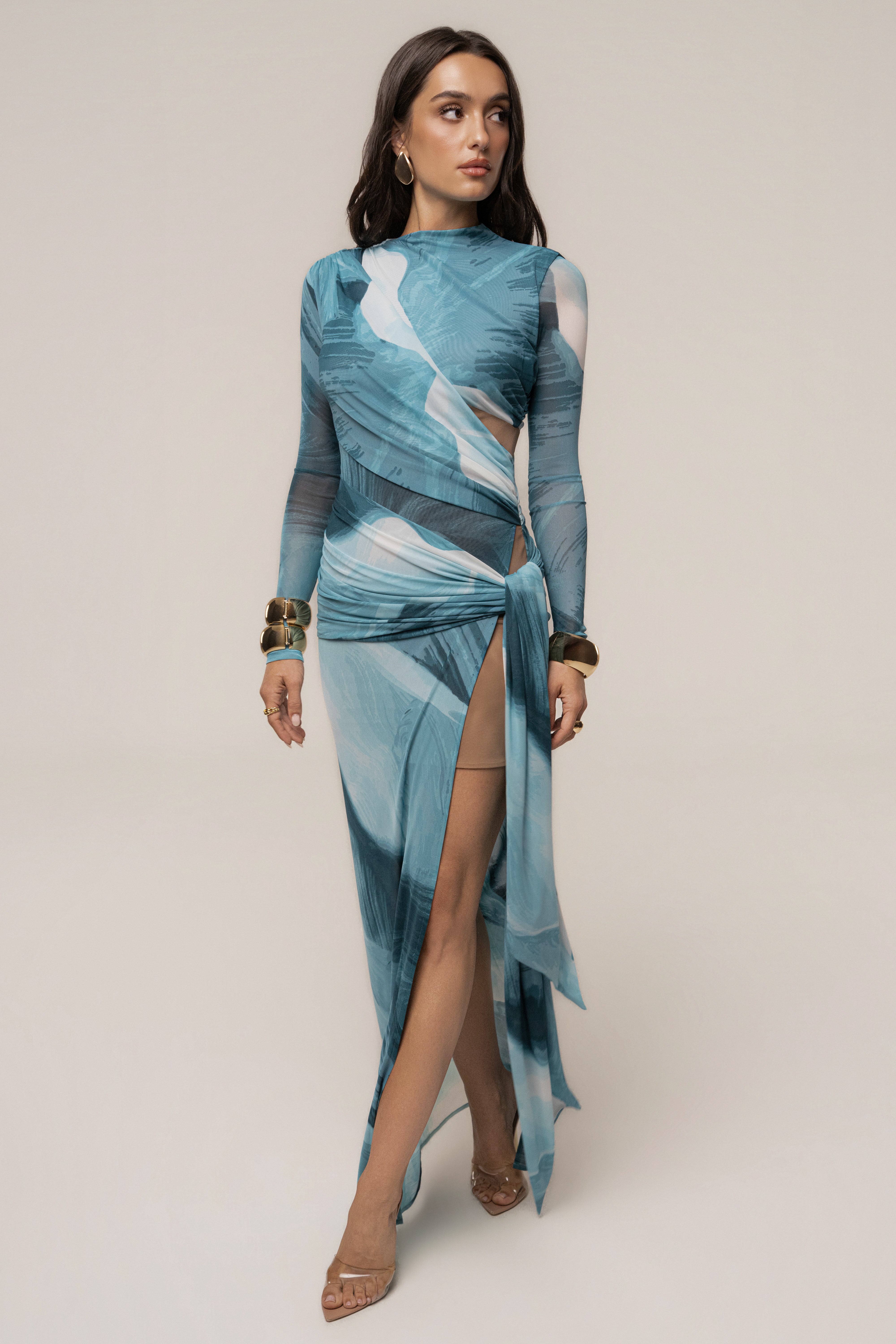 Sunset Blue Heatwave Mesh Maxi Dress by JLUXLABEL featuring a flowing maxi length and vibrant sunset-inspired blue mesh fabric.