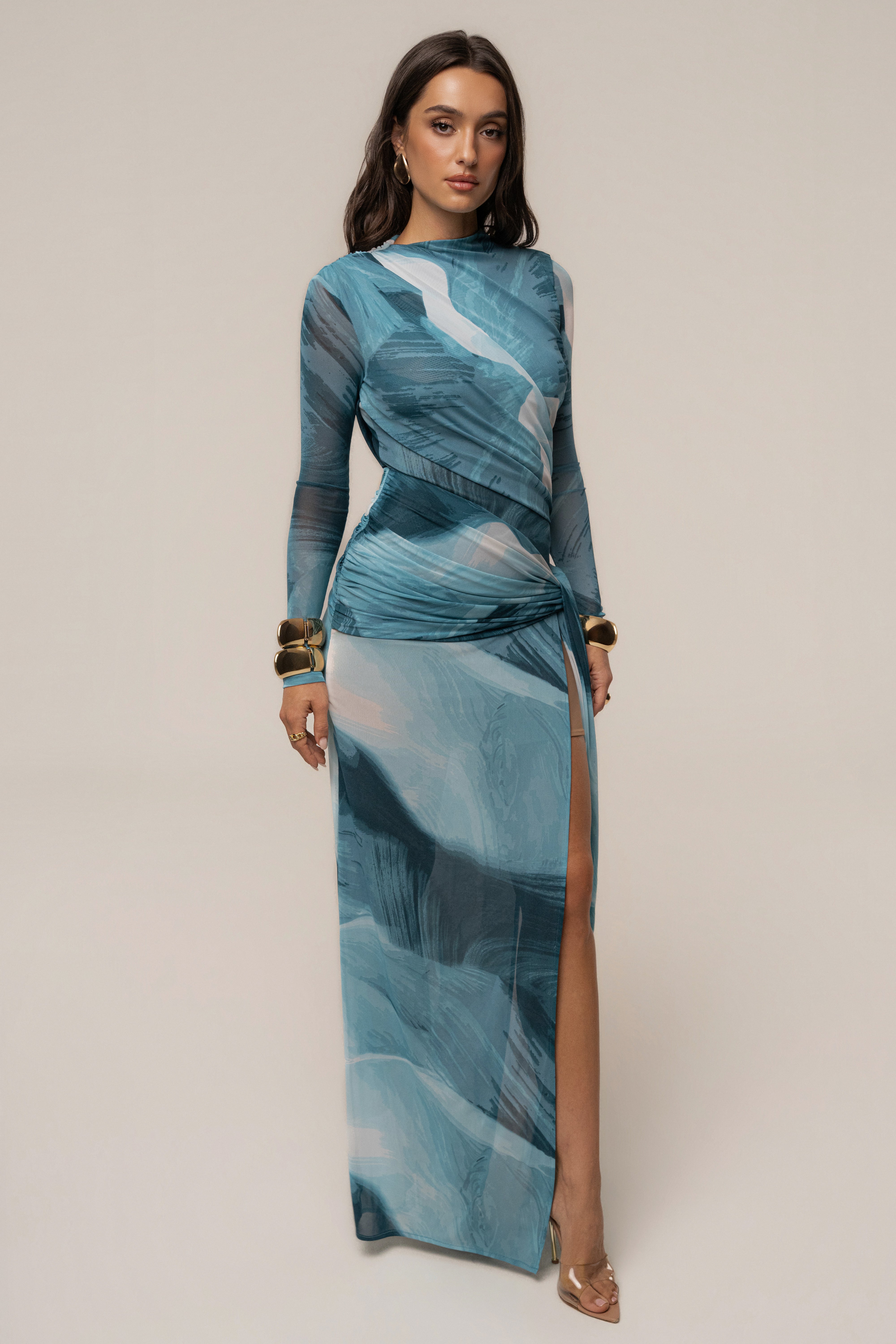 Sunset Blue Heatwave Mesh Maxi Dress by JLUXLABEL featuring a flowing design with mesh fabric and vibrant sunset-inspired colors.