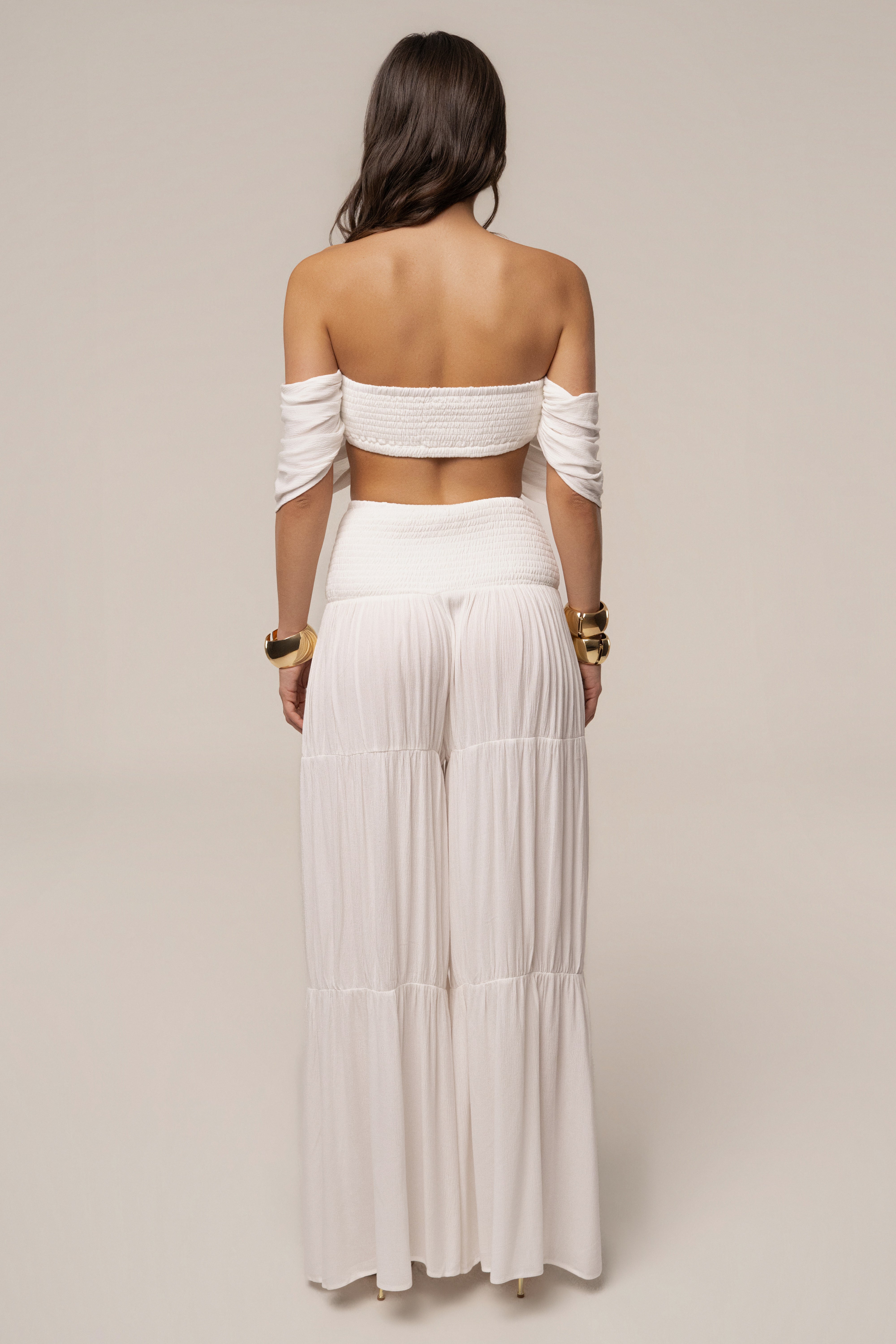 Ivory Hidden Gems tier pant set by JLUXLABEL featuring layered, flowing fabric with a relaxed fit and stylish design.