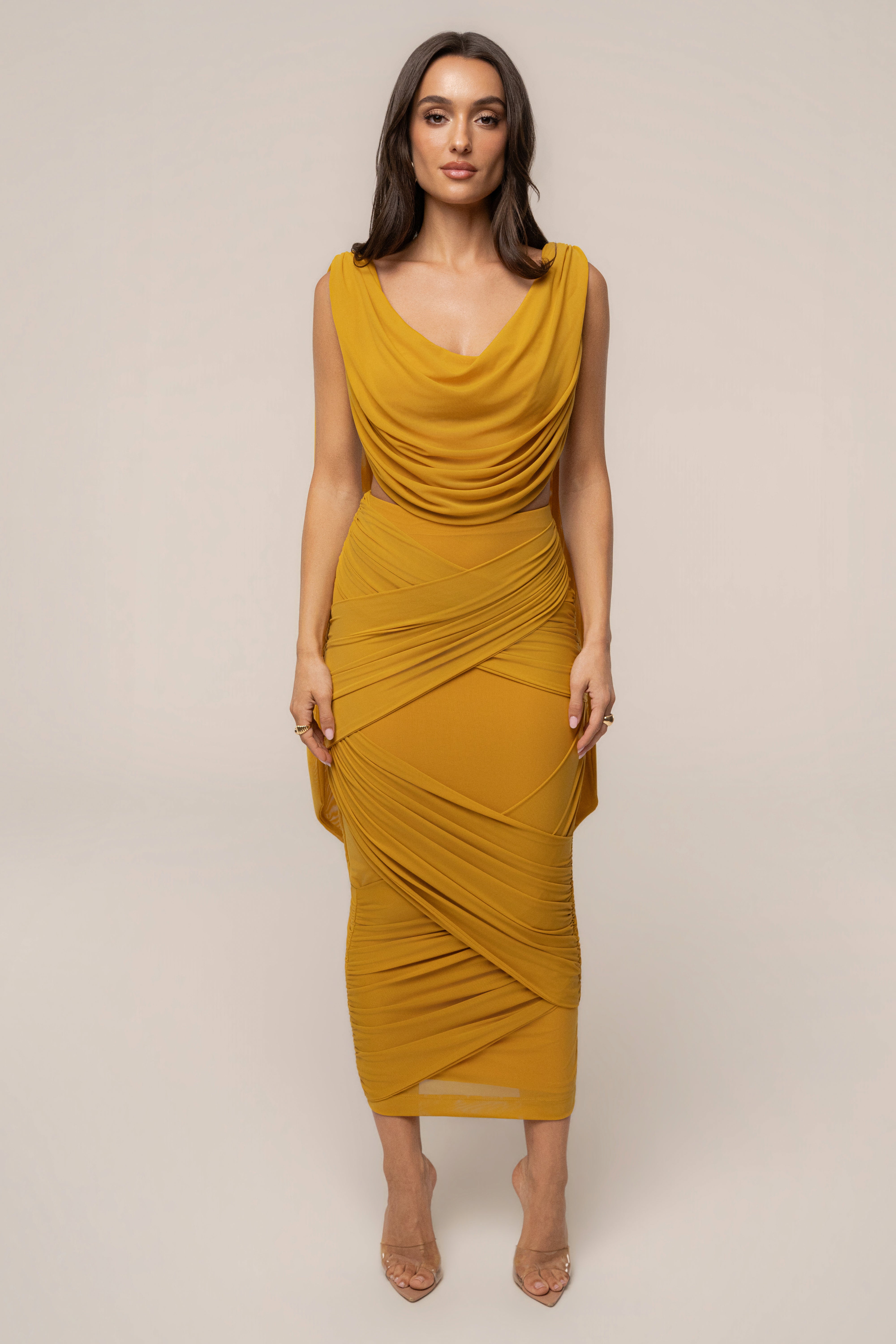 Yellow Divine Drape Mesh Skirt Set by JLUXLABEL featuring a flowing mesh skirt and matching top, stylish and elegant ensemble.