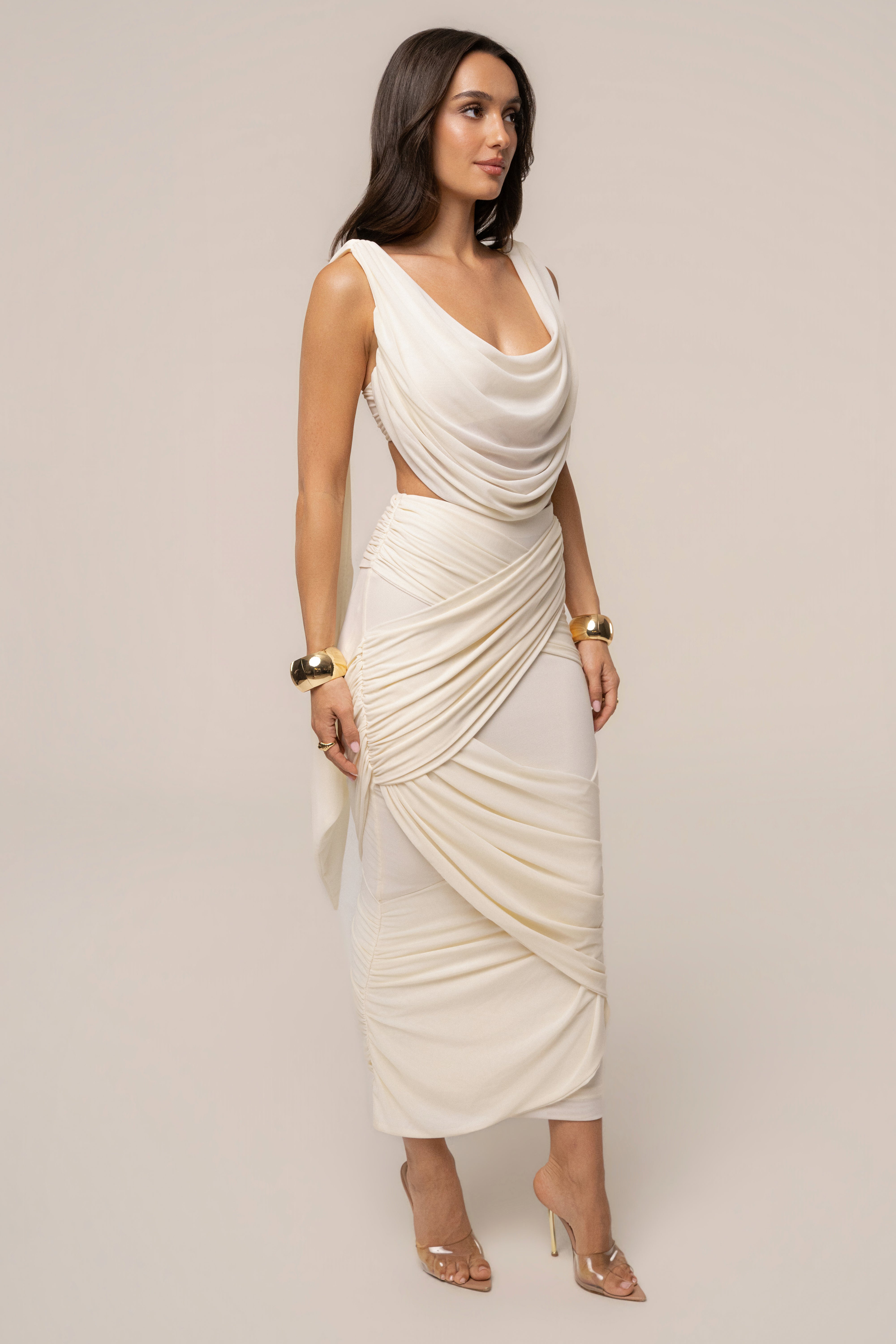 Ivory Divine Drape Mesh Skirt Set by JLUXLABEL featuring a flowing skirt and matching top, styled for a chic, elegant look.