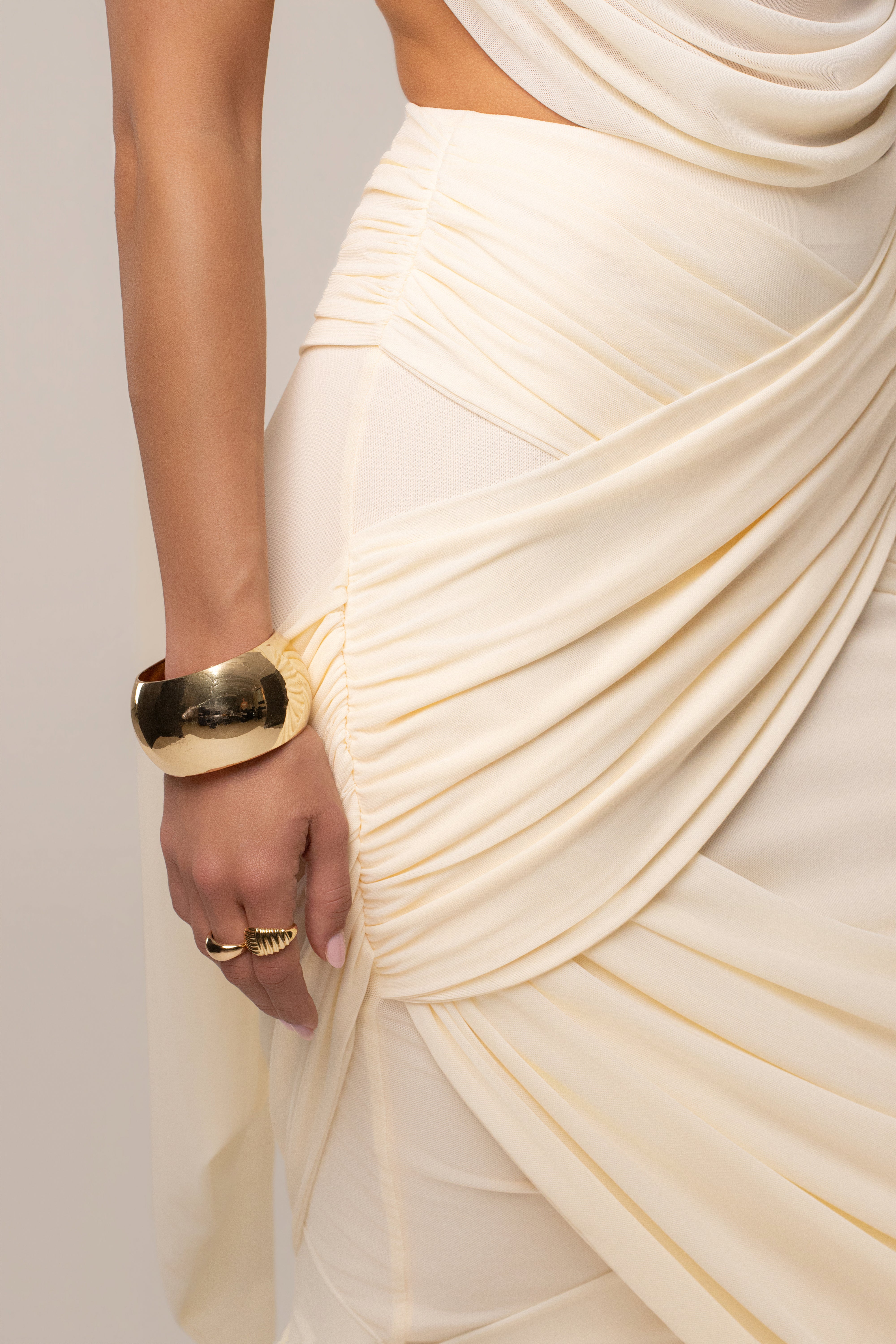 Ivory Divine Drape Mesh Skirt Set by JLUXLABEL, featuring a stylish mesh skirt and matching top for a chic look.