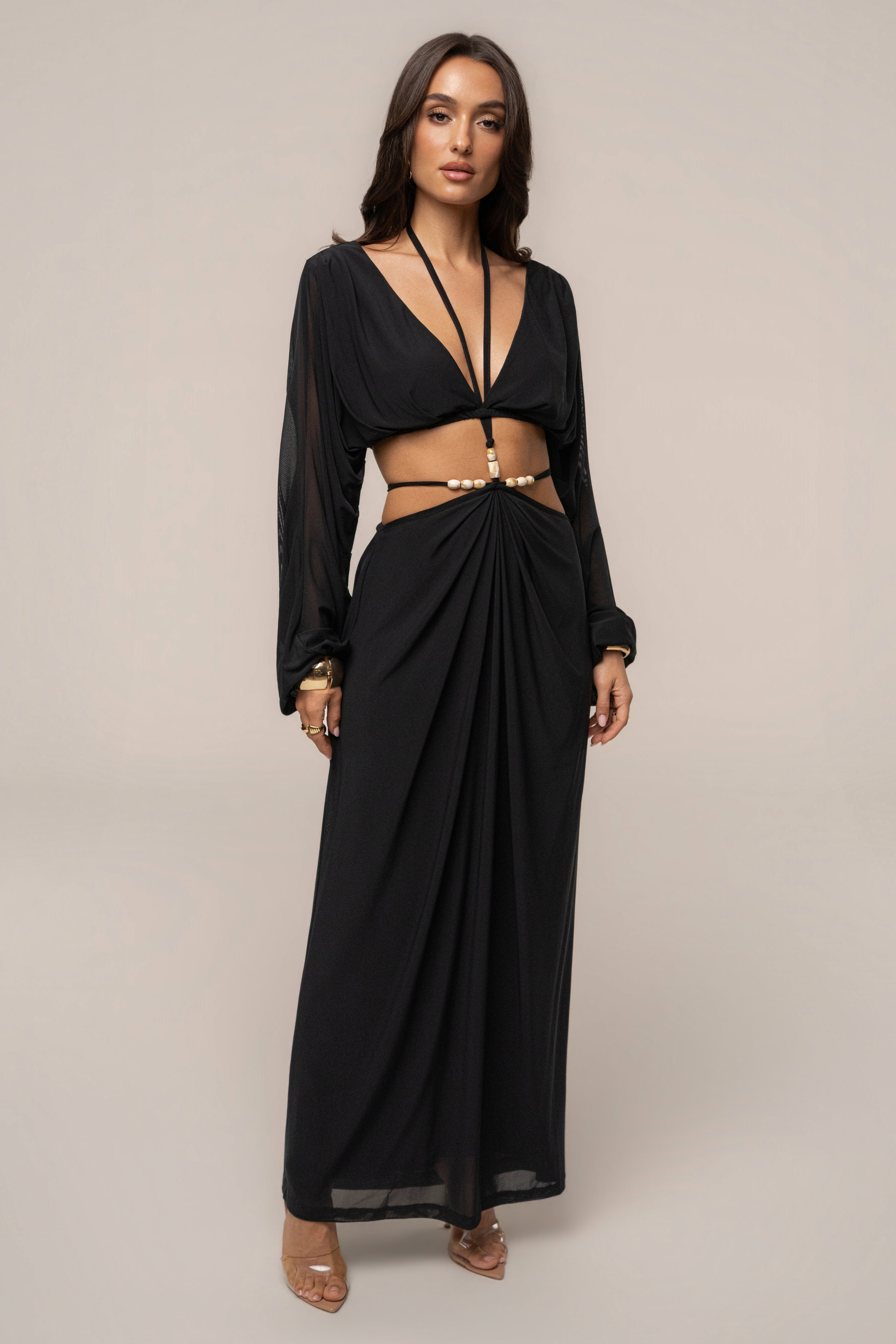Black Selene Draped Top by JLUXLABEL, featuring a stylish draped design and long sleeves, perfect for chic casual wear.