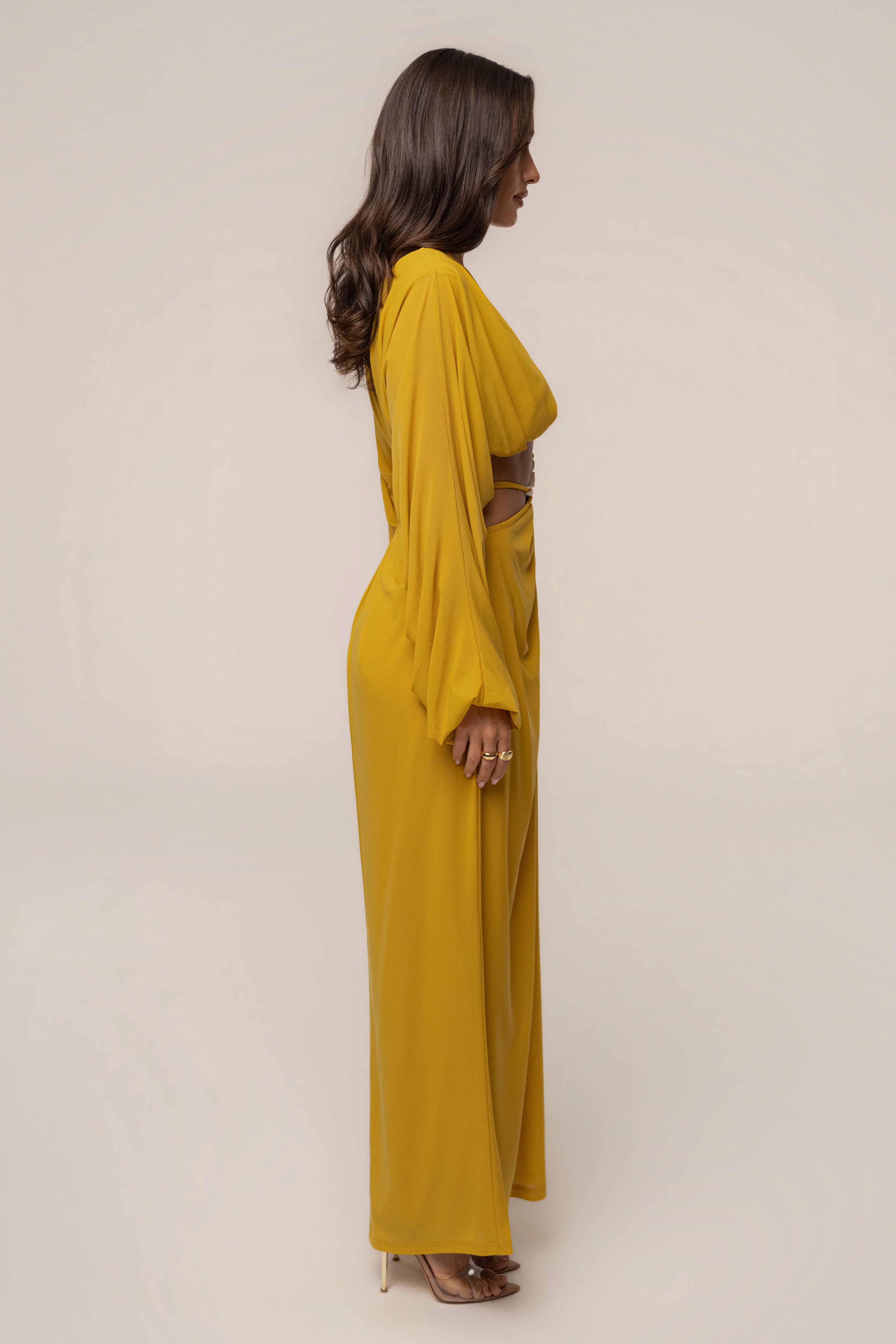 Mustard Hera draped maxi skirt by JLUXLABEL, flowing bottom with elegant drape and high waist, shown laid flat on a white background.