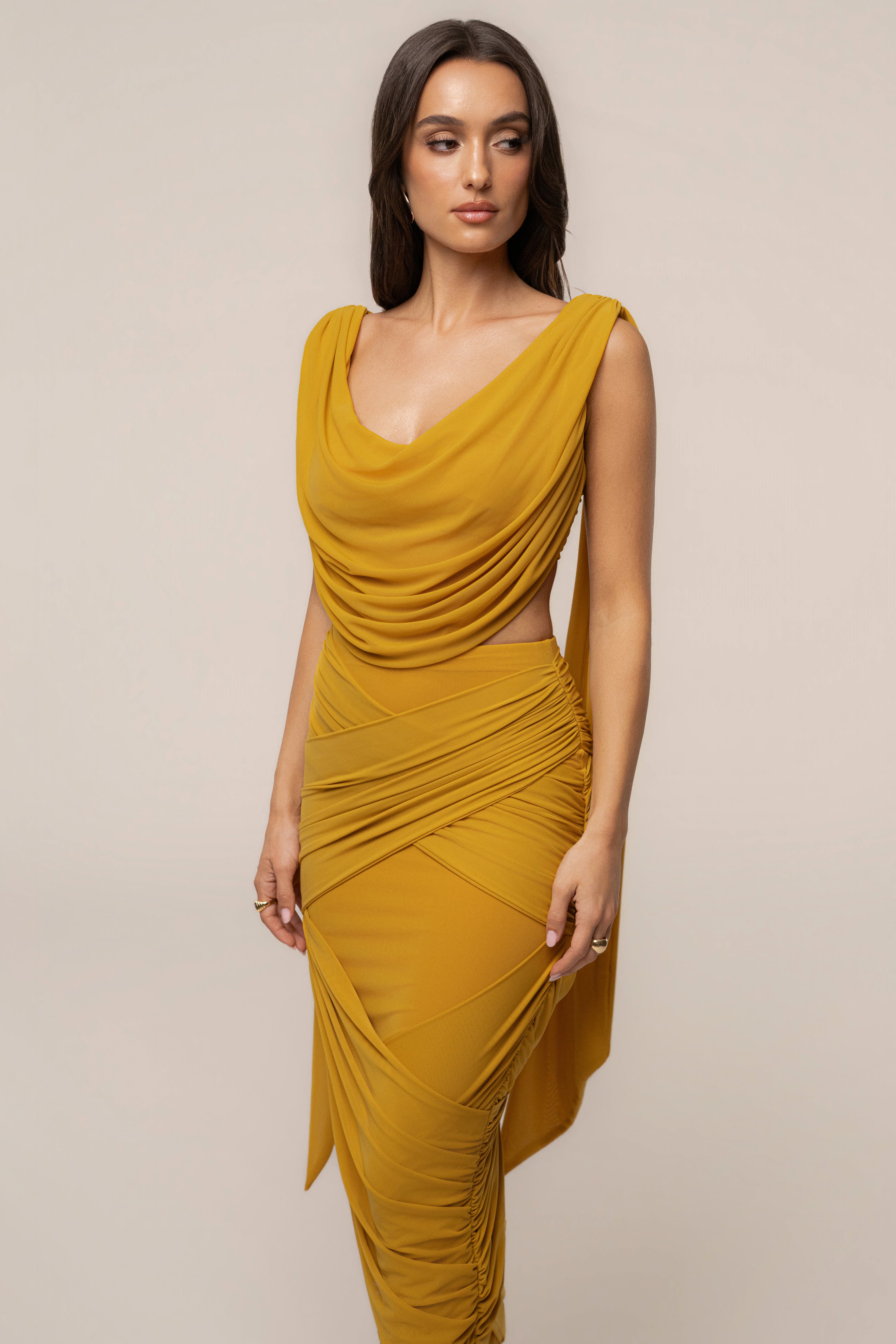 Yellow Divine Drape Mesh Skirt Set by JLUXLABEL, featuring a flowing mesh skirt and matching top, styled for a chic look.