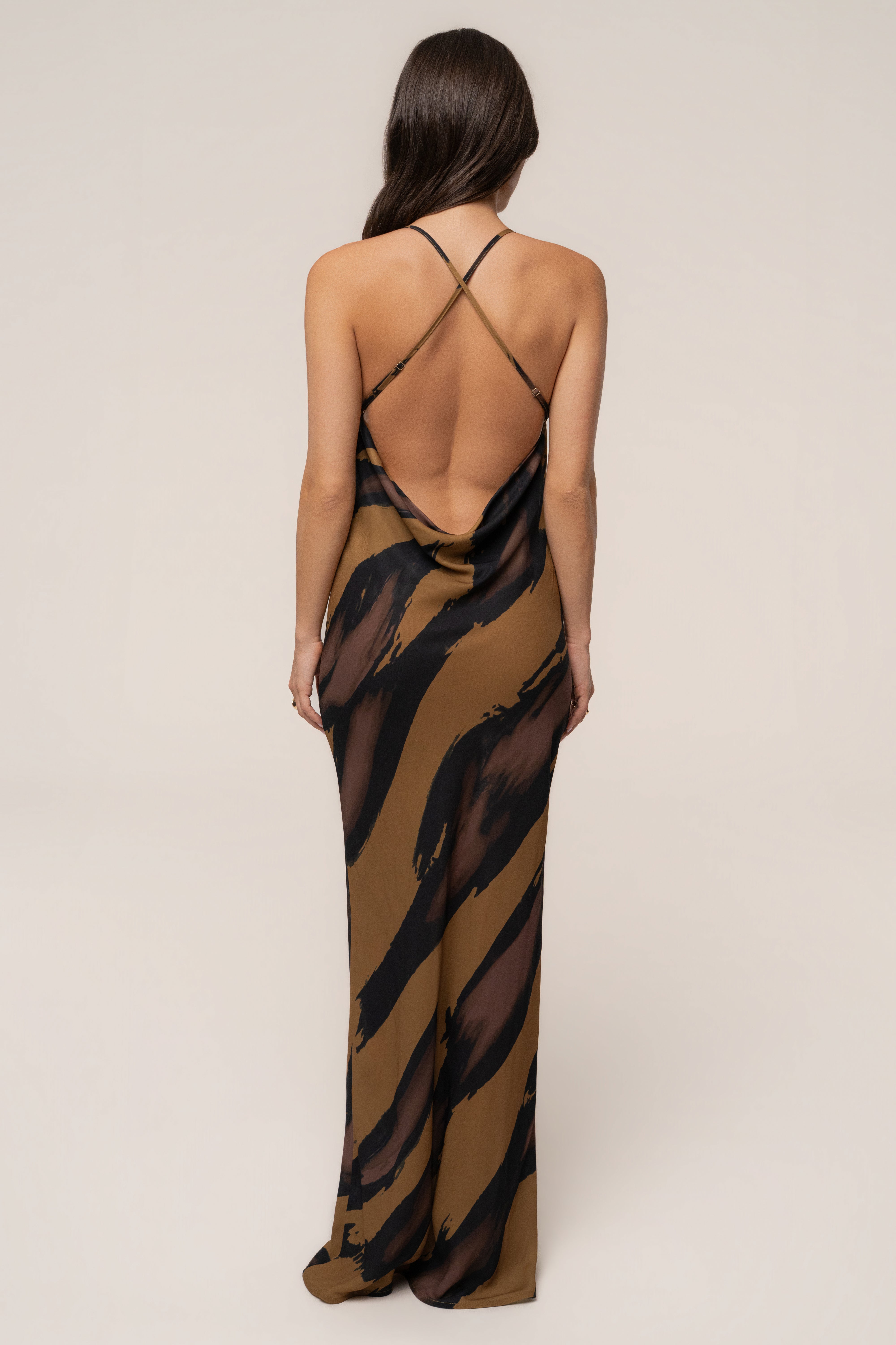 Gold Dusk Infinite Journey maxi dress by JLUXLABEL featuring flowing fabric and elegant design in a warm gold hue