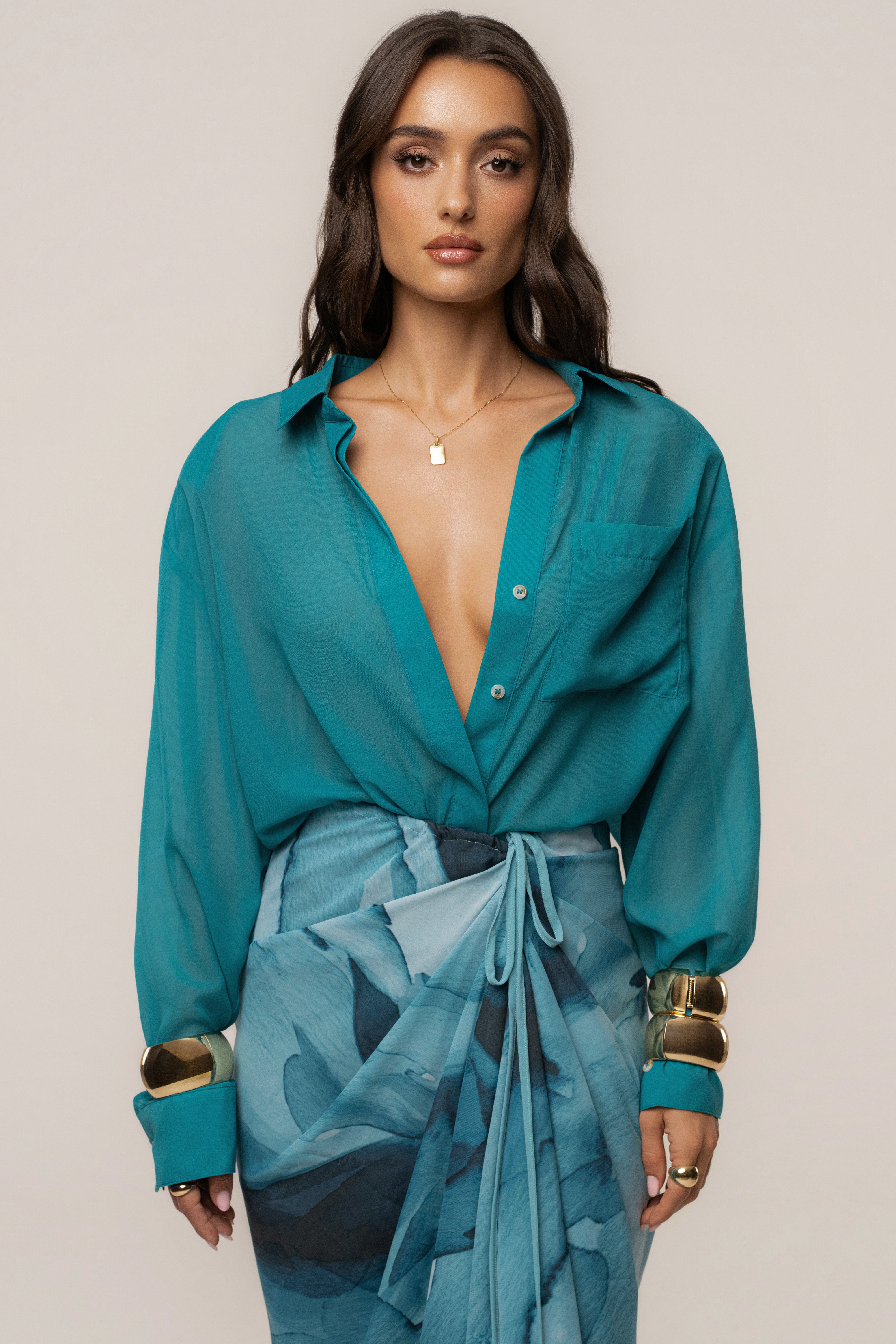 Aqua Fierce JLUXLABEL button-down shirt with long sleeves and collar, casual tops for women, styled on a model.