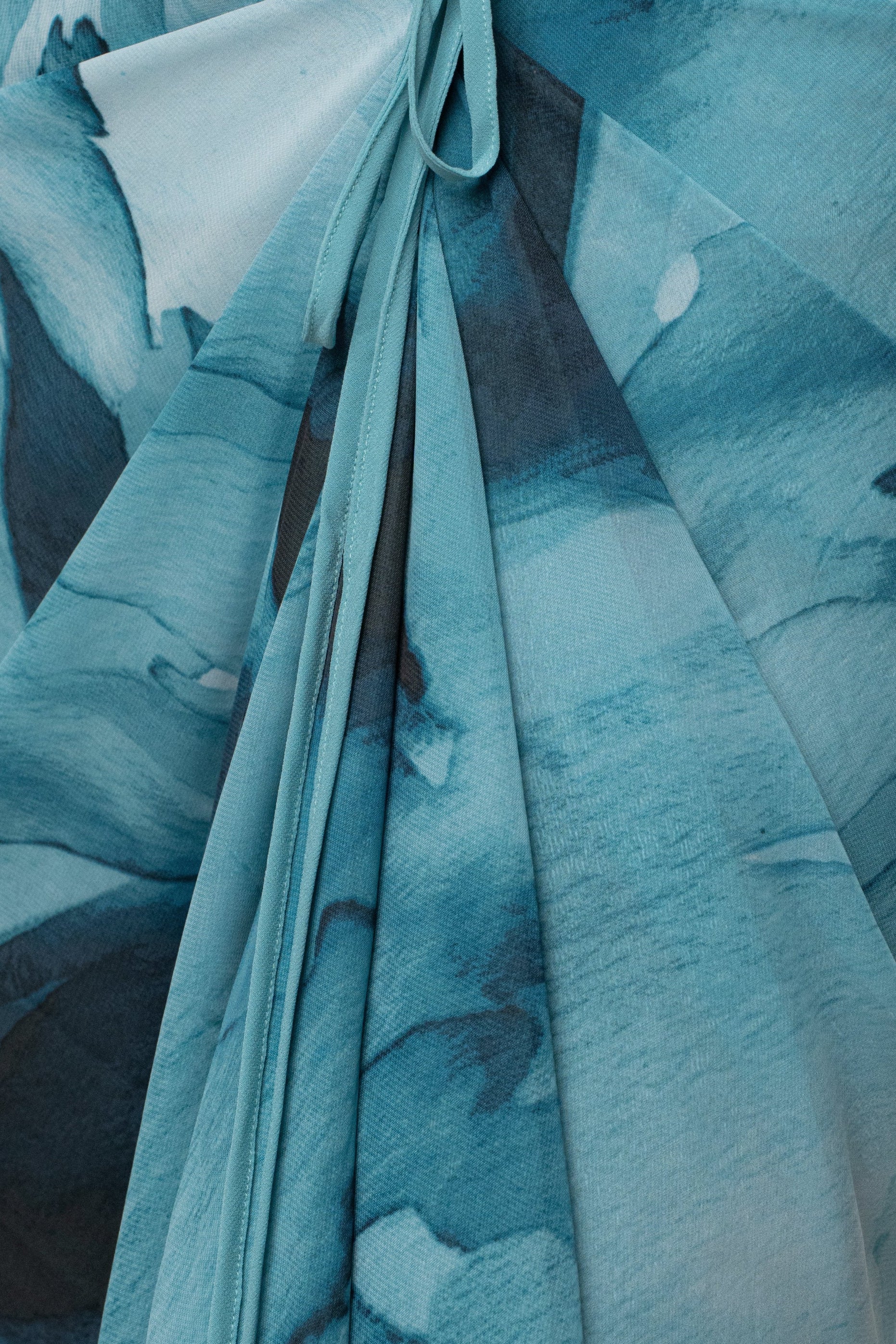 Blue abstract printed skirt from JLUXLABEL featuring a stylish, flowy design perfect for casual or dressy outfits.