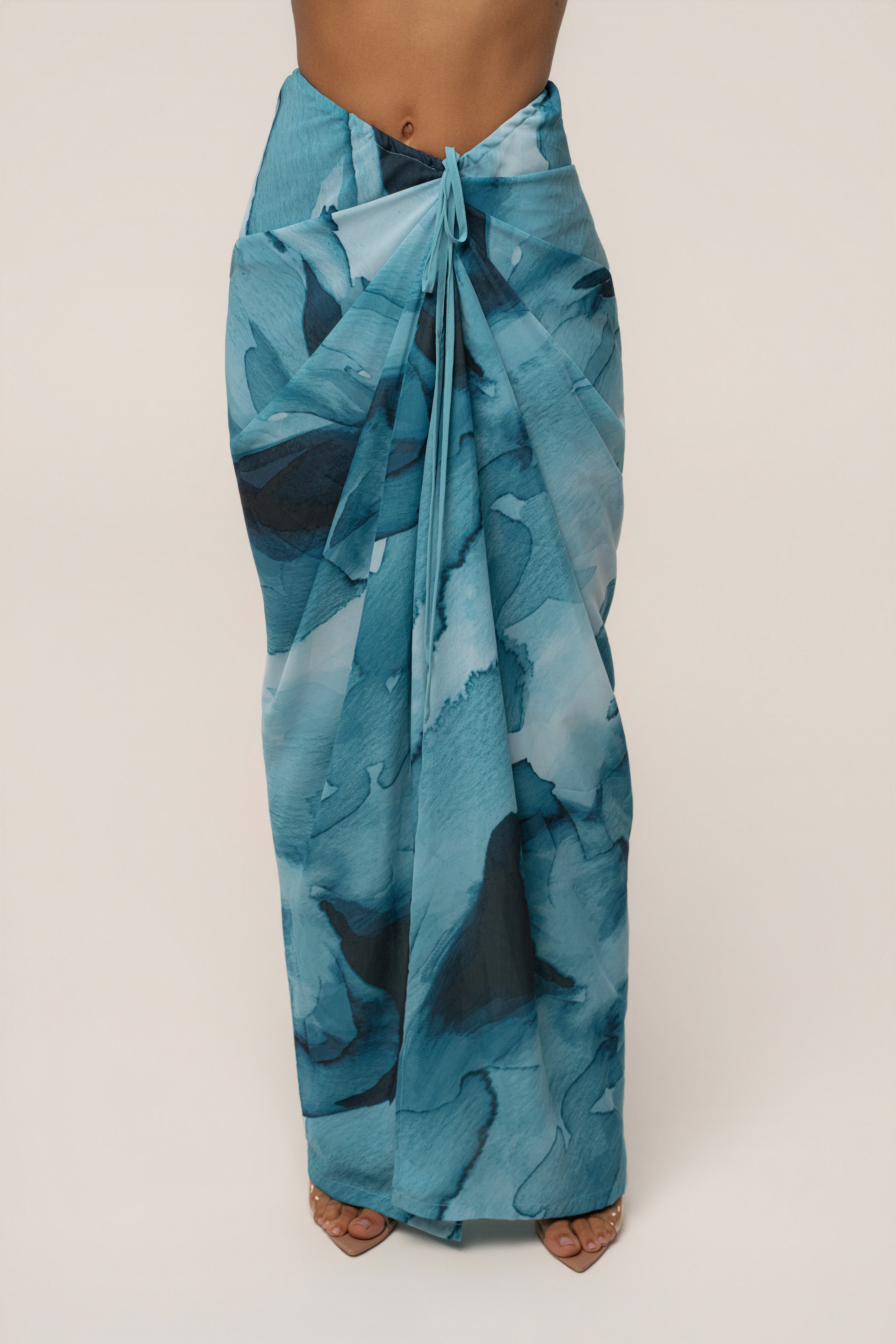 Blue abstract printed skirt by JLUXLABEL, featuring a stylish and colorful design, perfect for casual or dressy outfits.