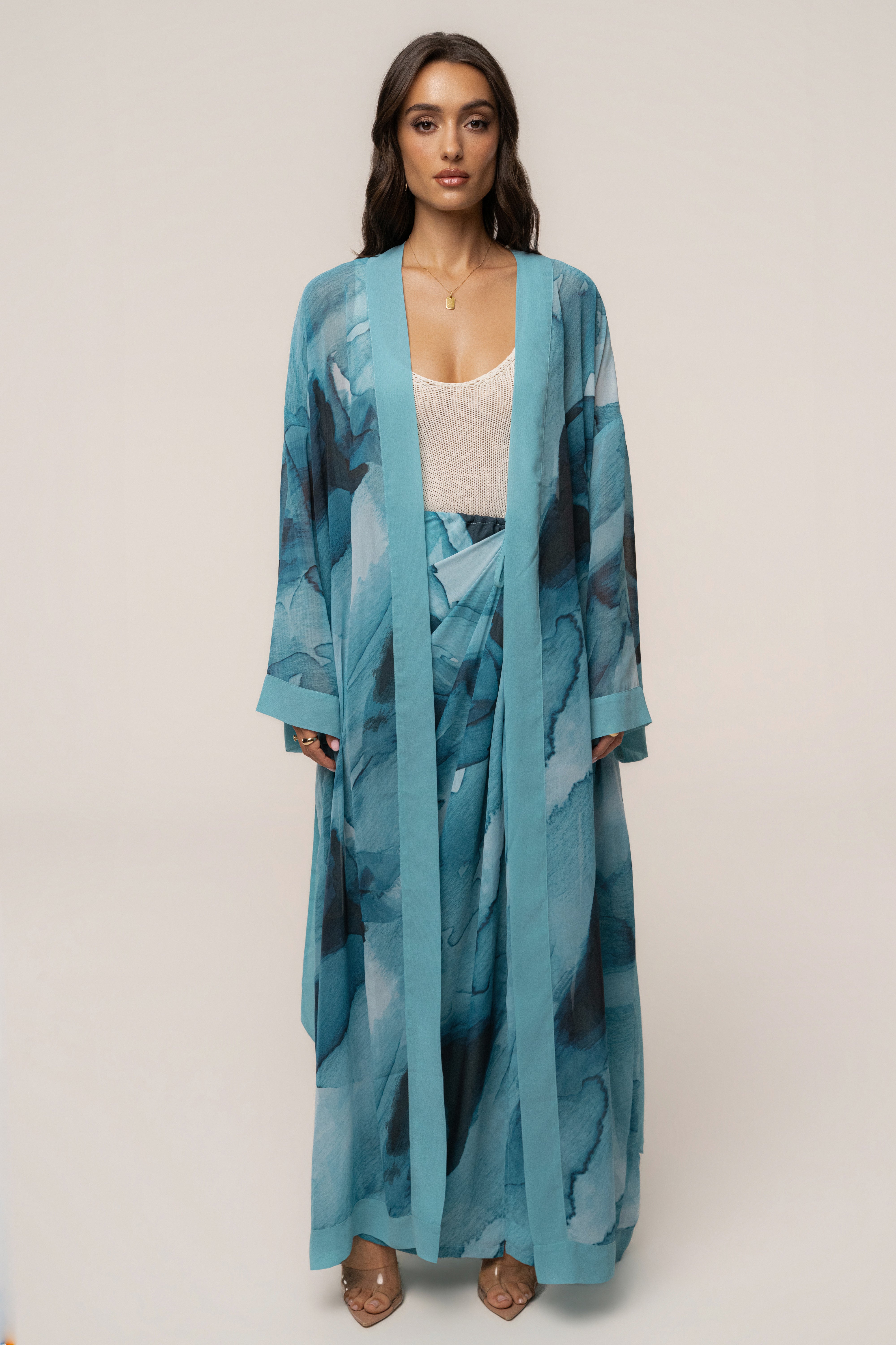 Blue abstract printed duster outerwear by JLUXLABEL featuring a flowing, lightweight design with vibrant abstract patterns.