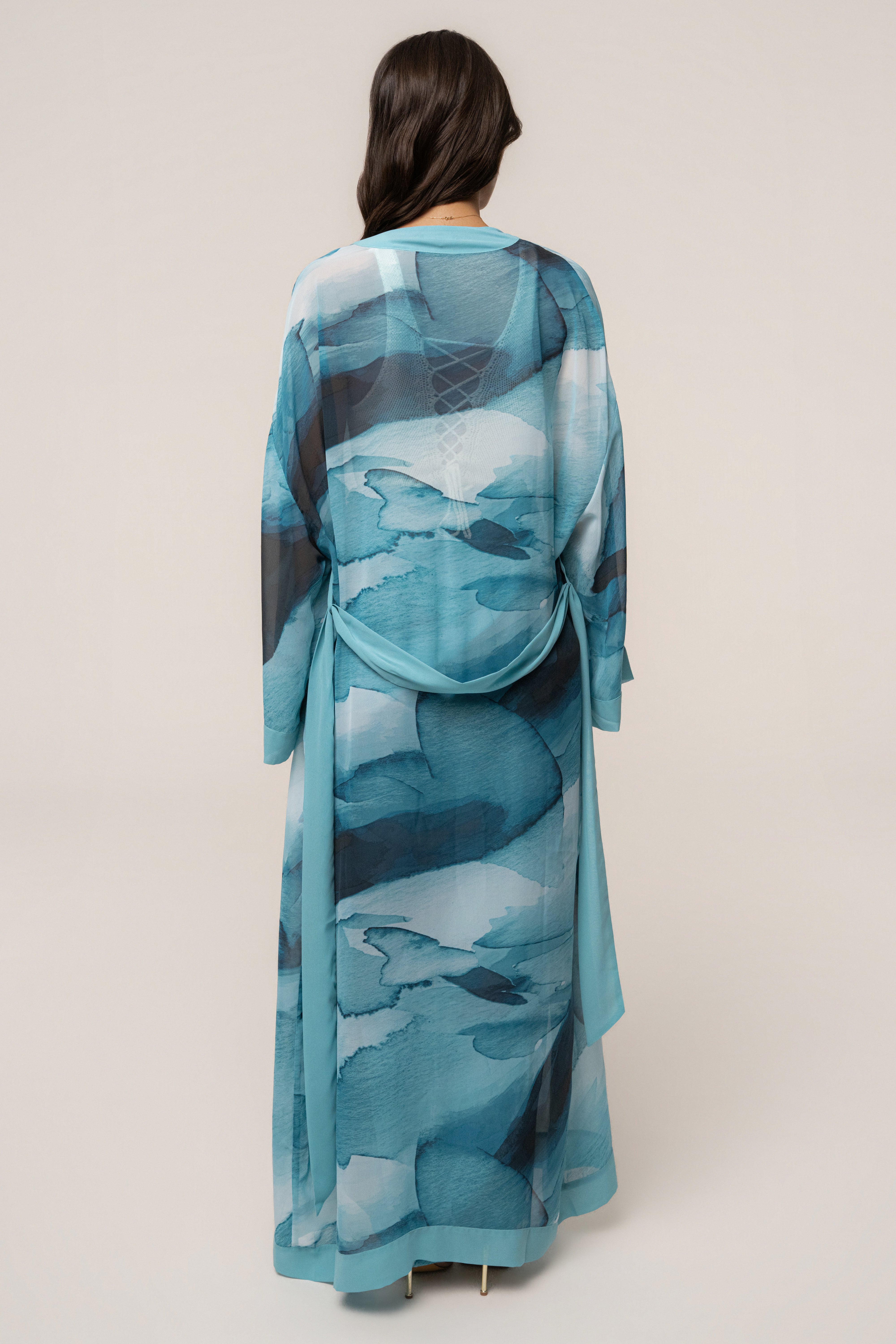 Blue abstract printed duster outerwear by JLUXLABEL, featuring a flowing design and vibrant pattern, perfect for stylish layering.