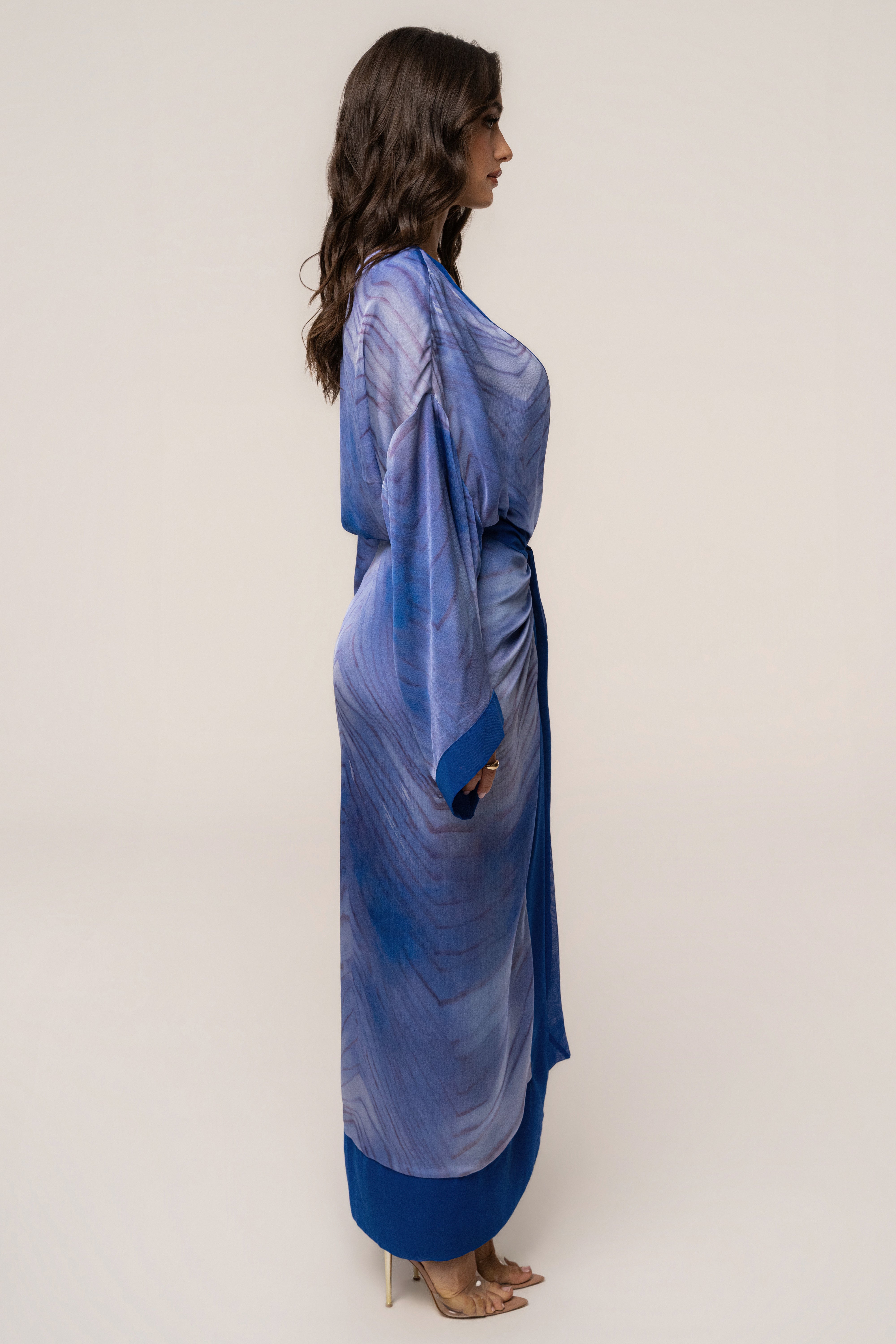 Blue Bahía satin duster outerwear by JLUXLABEL featuring a flowing, silky fabric and elegant long design.