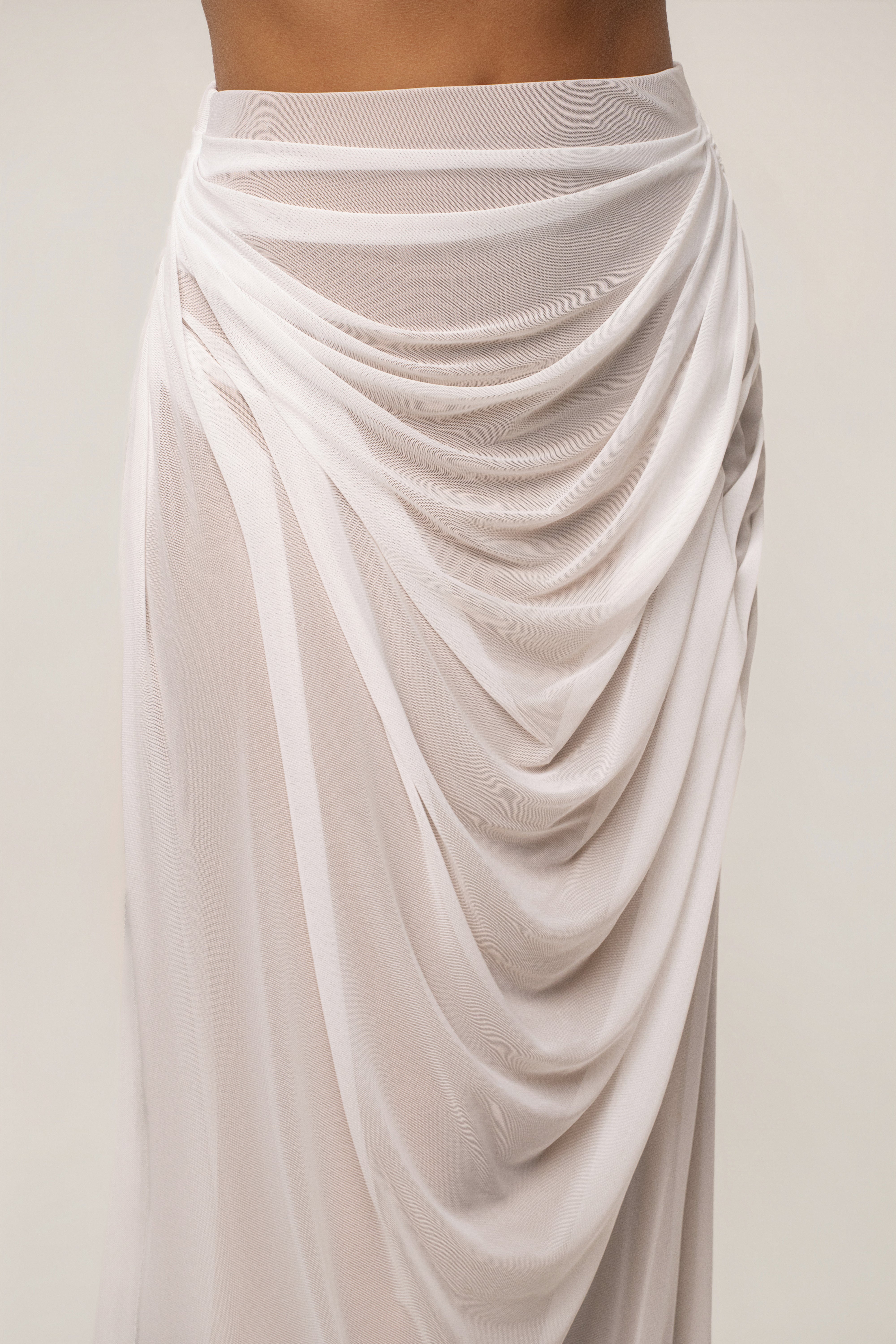 Ivory Ethereal Flow Maxi Skirt by JLUXLABEL, flowing lightweight bottoms with a soft, elegant design perfect for casual or dressy wear.