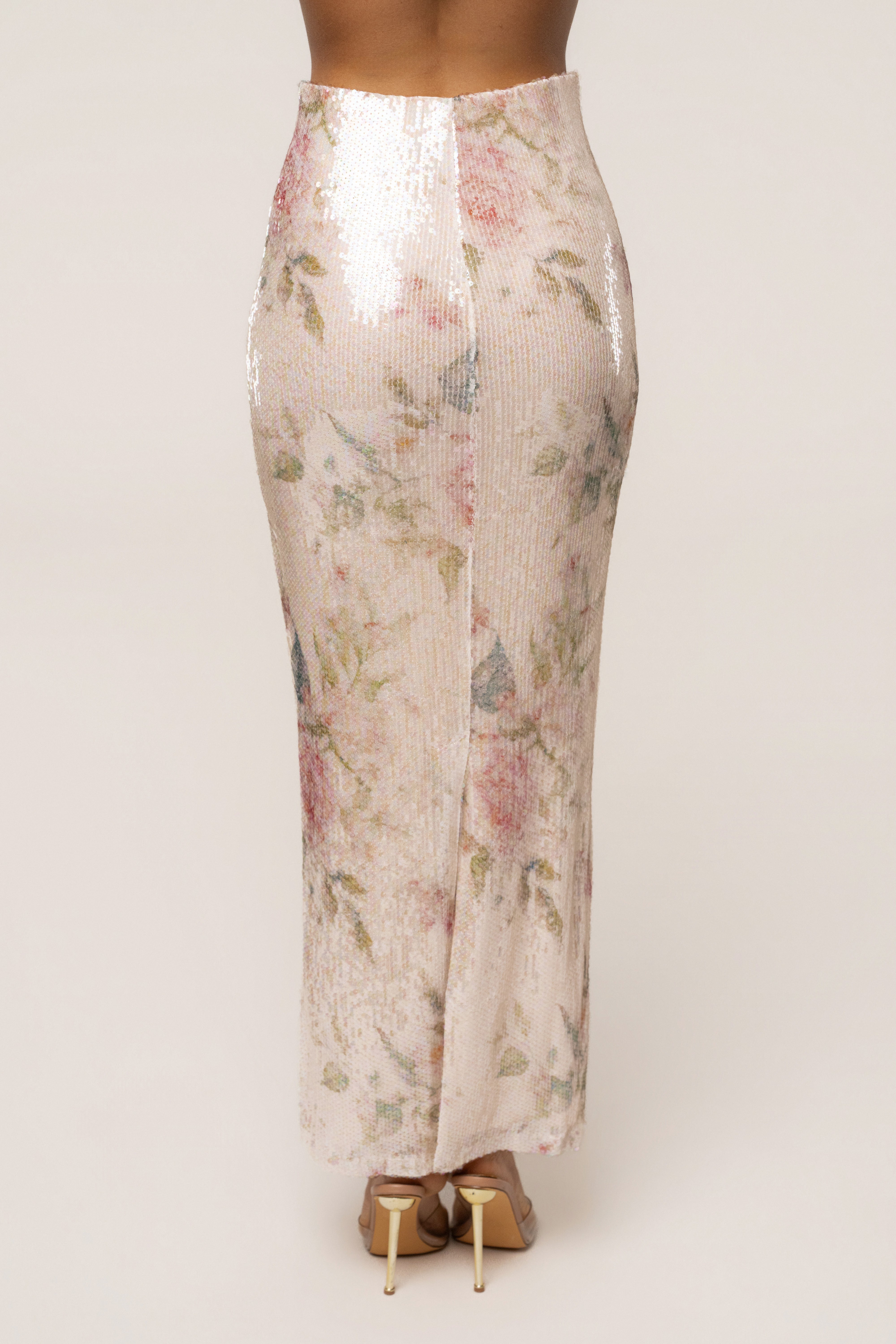 Ivory floral Villa Nights sequin skirt by JLUXLABEL, showing flowing fabric and intricate floral embroidery detail.
