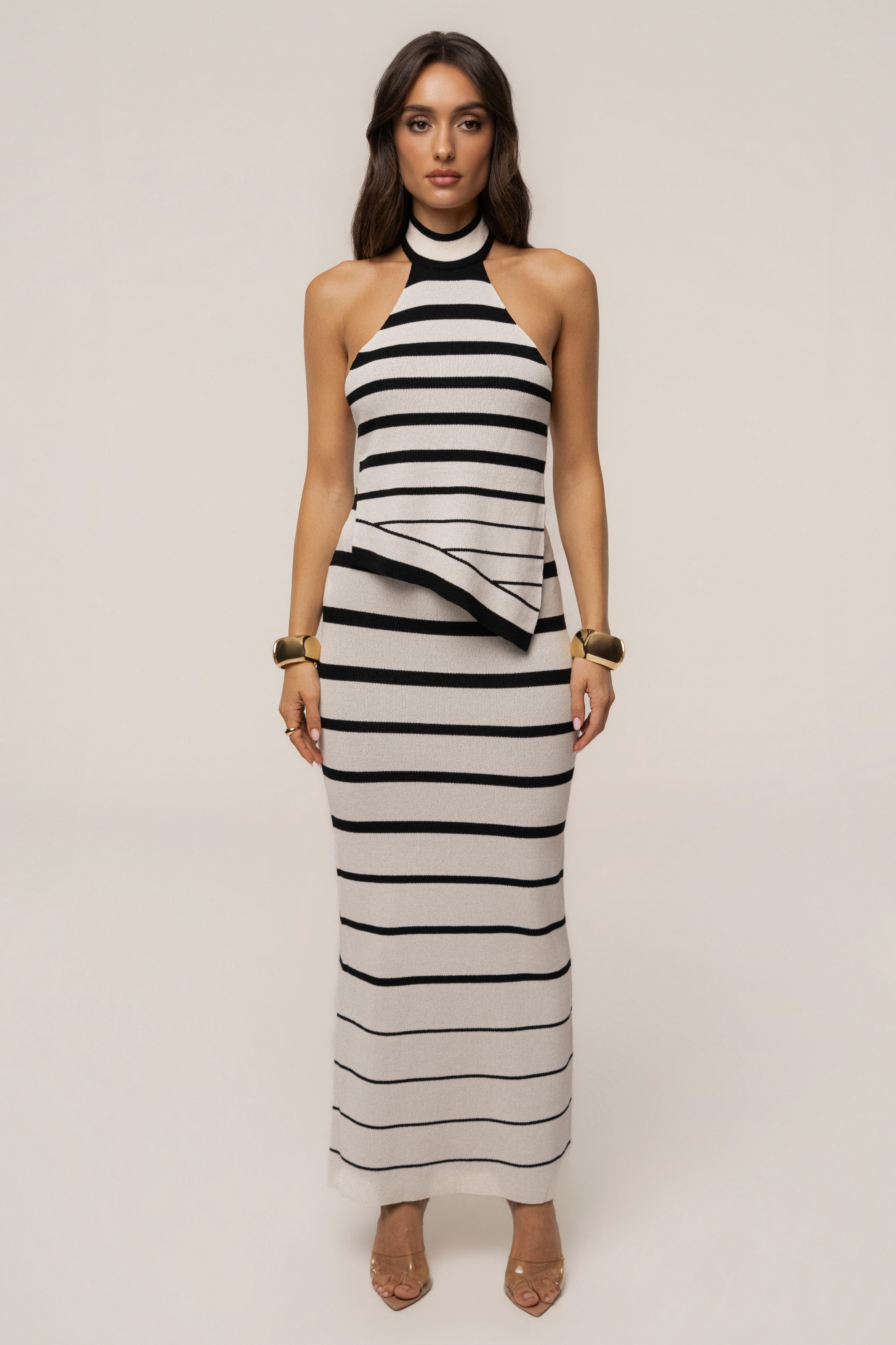 White and black striped Marina Nights skirt set by JLUXLABEL, featuring a stylish coordinated top and skirt ensemble.