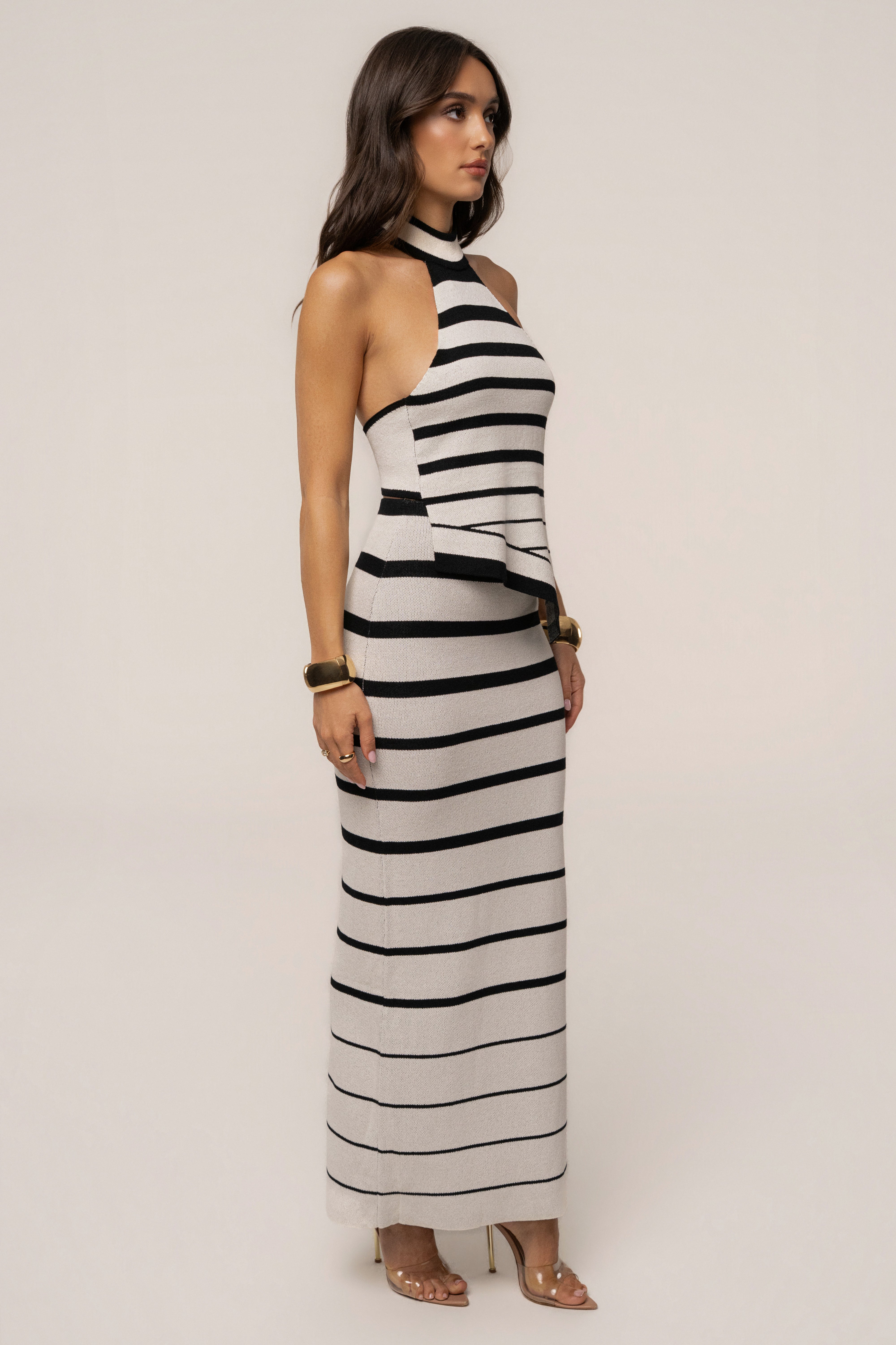 White and black striped Marina Nights skirt set by JLUXLABEL, featuring a stylish matching top and skirt ensemble.