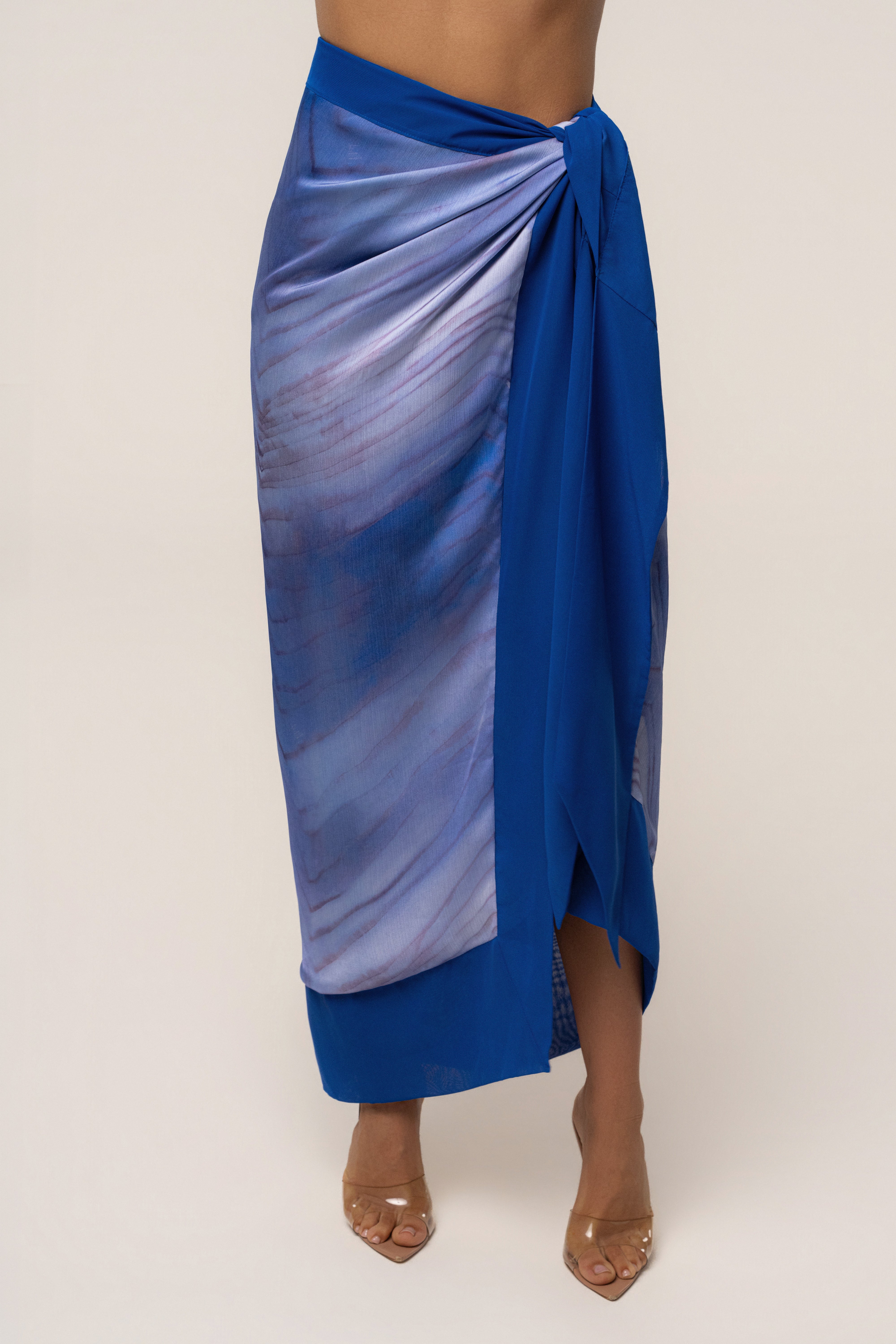 Blue Bahía wrap skirt from JLUXLABEL, stylish bottoms featuring a flattering wrap design and vibrant blue color.