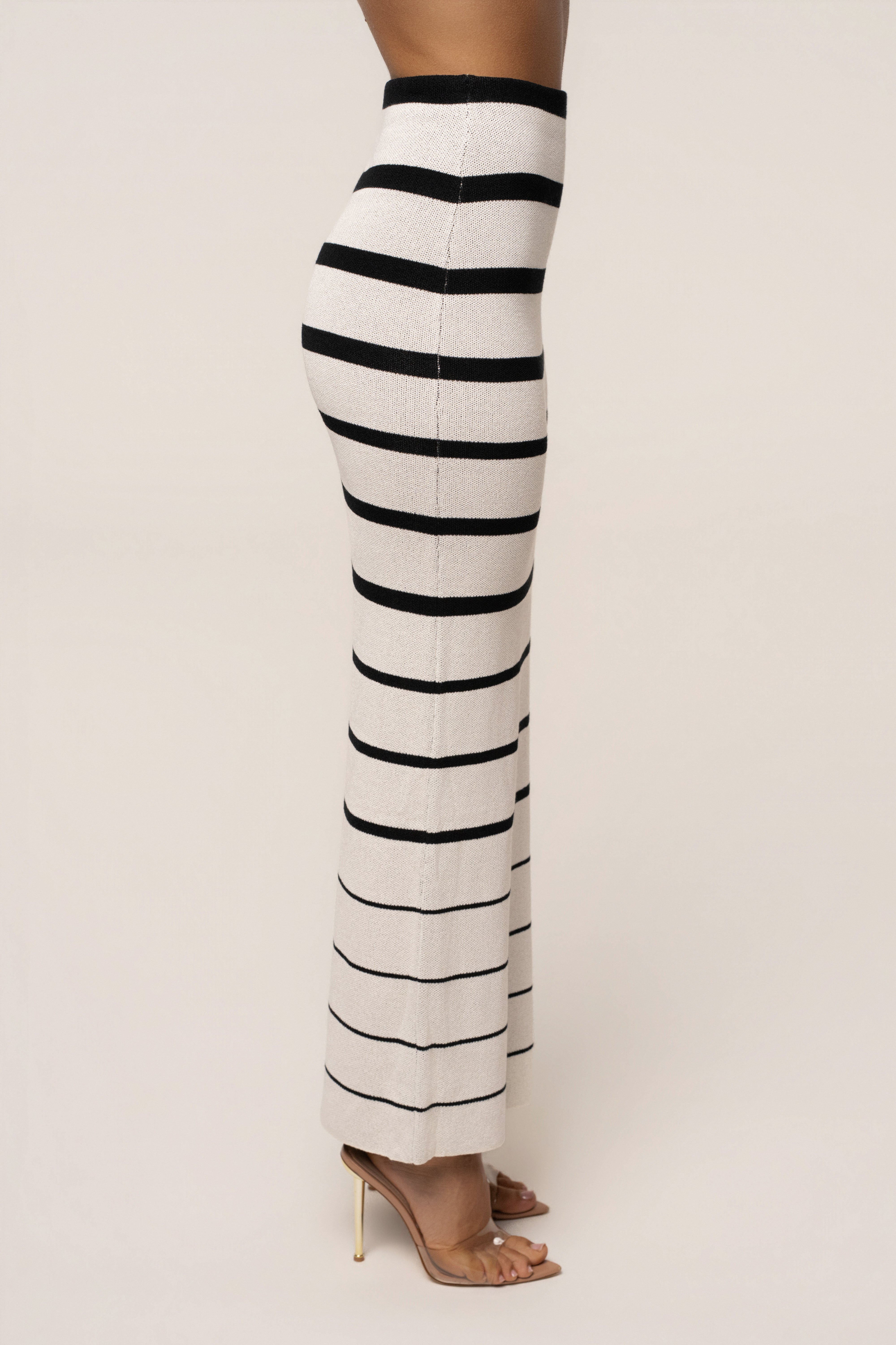 White and black striped Marina Nights skirt set by JLUXLABEL, featuring a stylish top and matching skirt for a chic look.