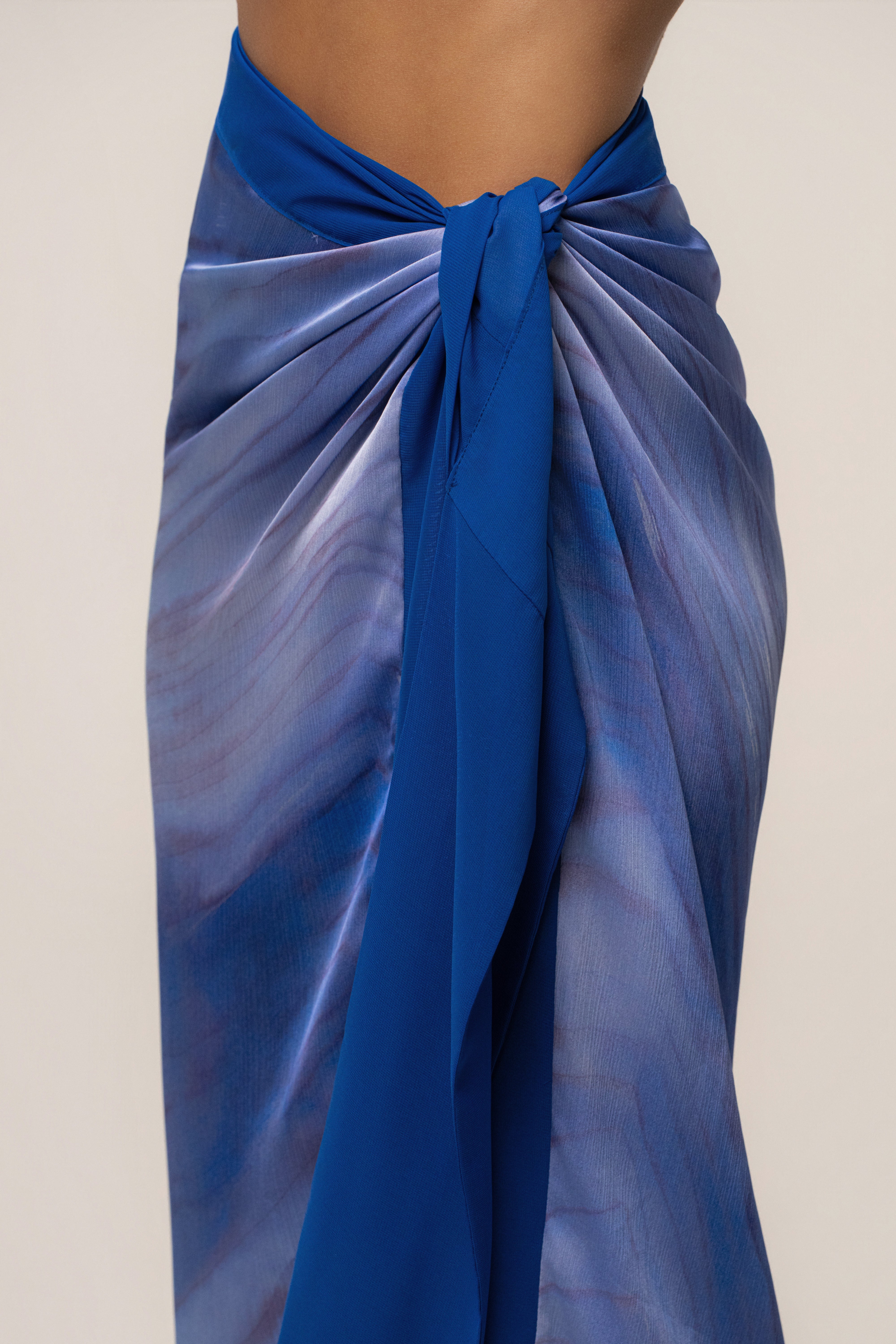 Blue Bahía wrap skirt by JLUXLABEL featuring a stylish design, perfect for casual or dressy summer outfits.