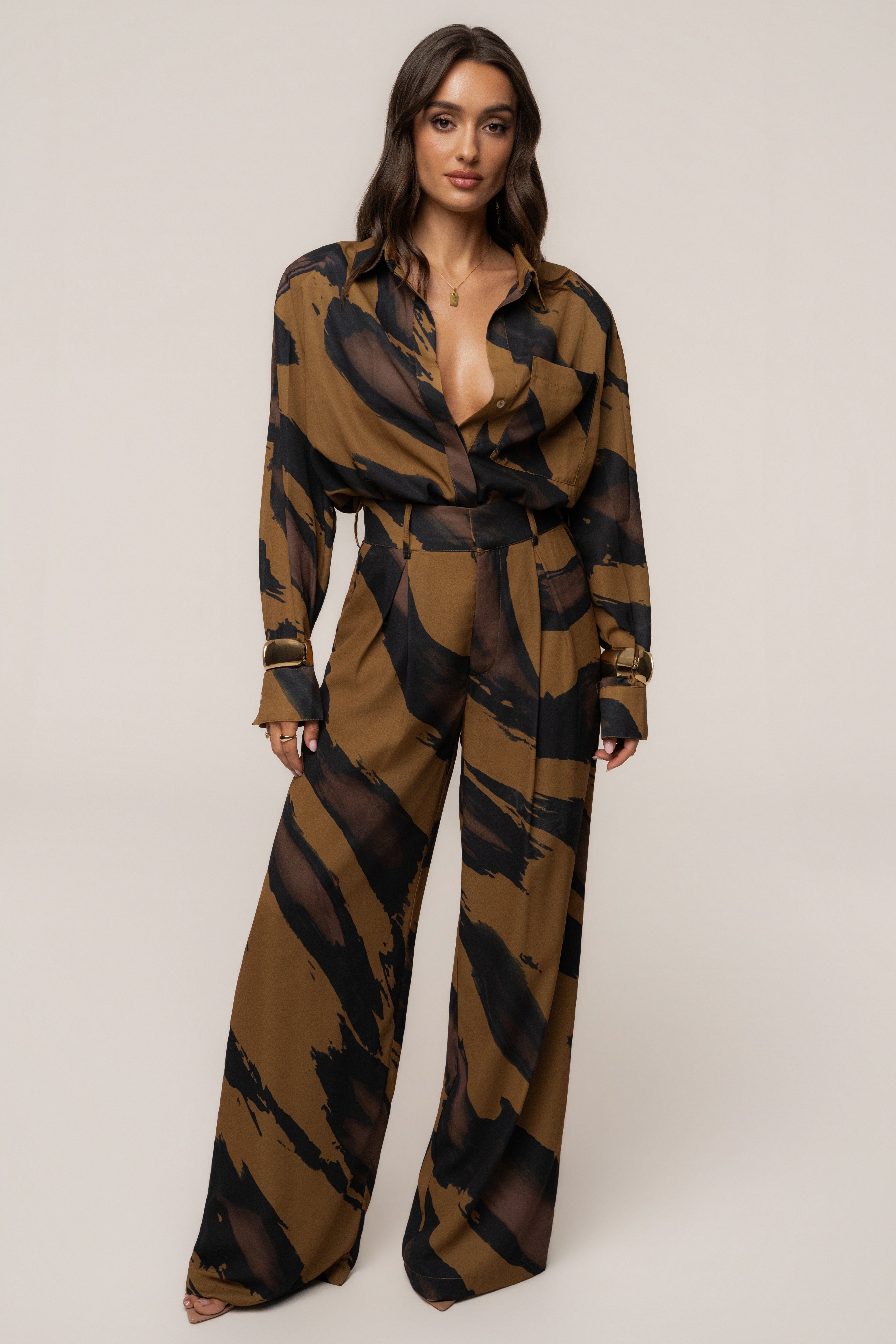 Gold Dusk Fierce Form button-down shirt by JLUXLABEL, showcasing a stylish gold-toned top with a classic collar and long sleeves.