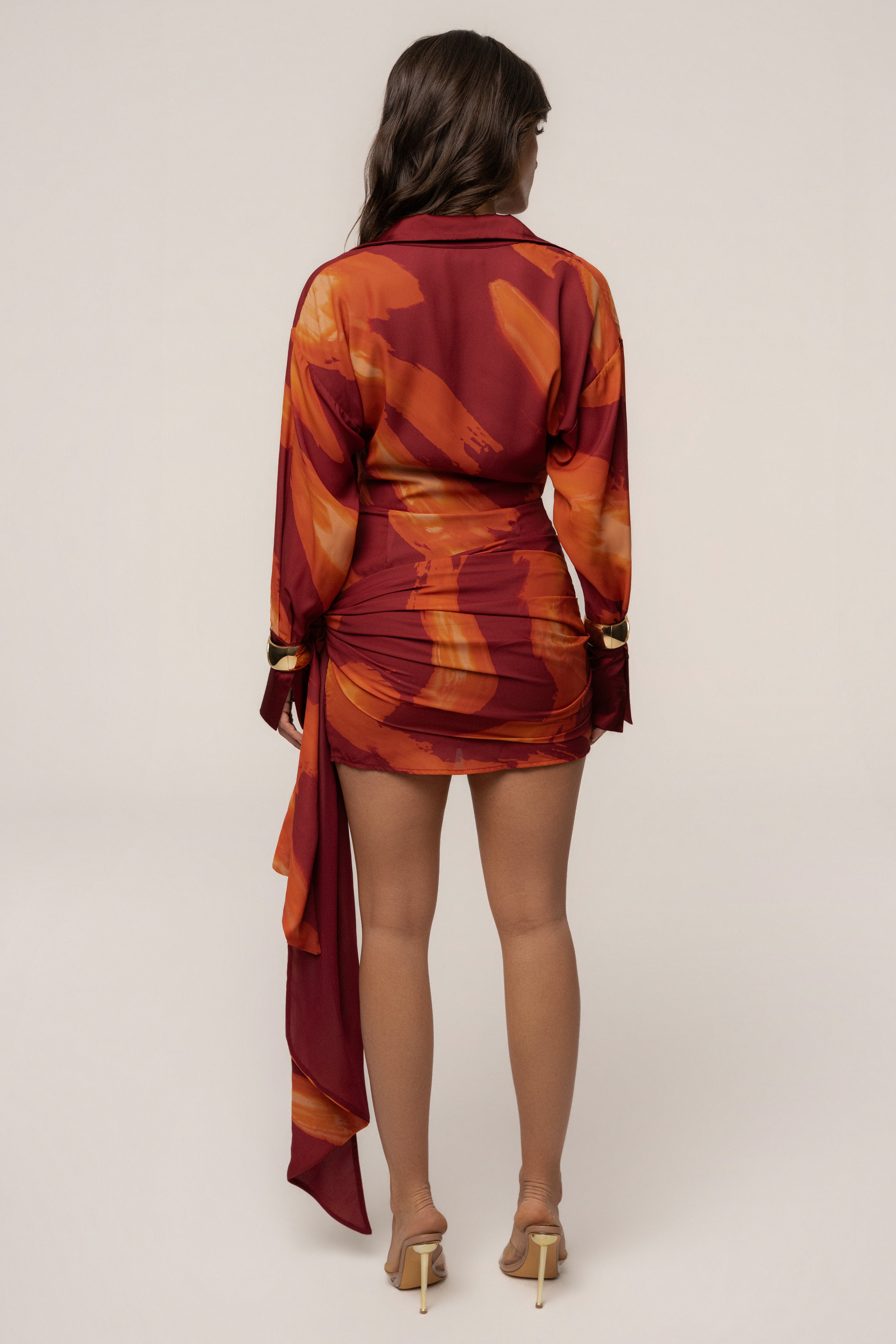 Crimson Dusk Midnight Confidence mini dress by JLUXLABEL, sleeveless with a fitted silhouette and deep V neckline.