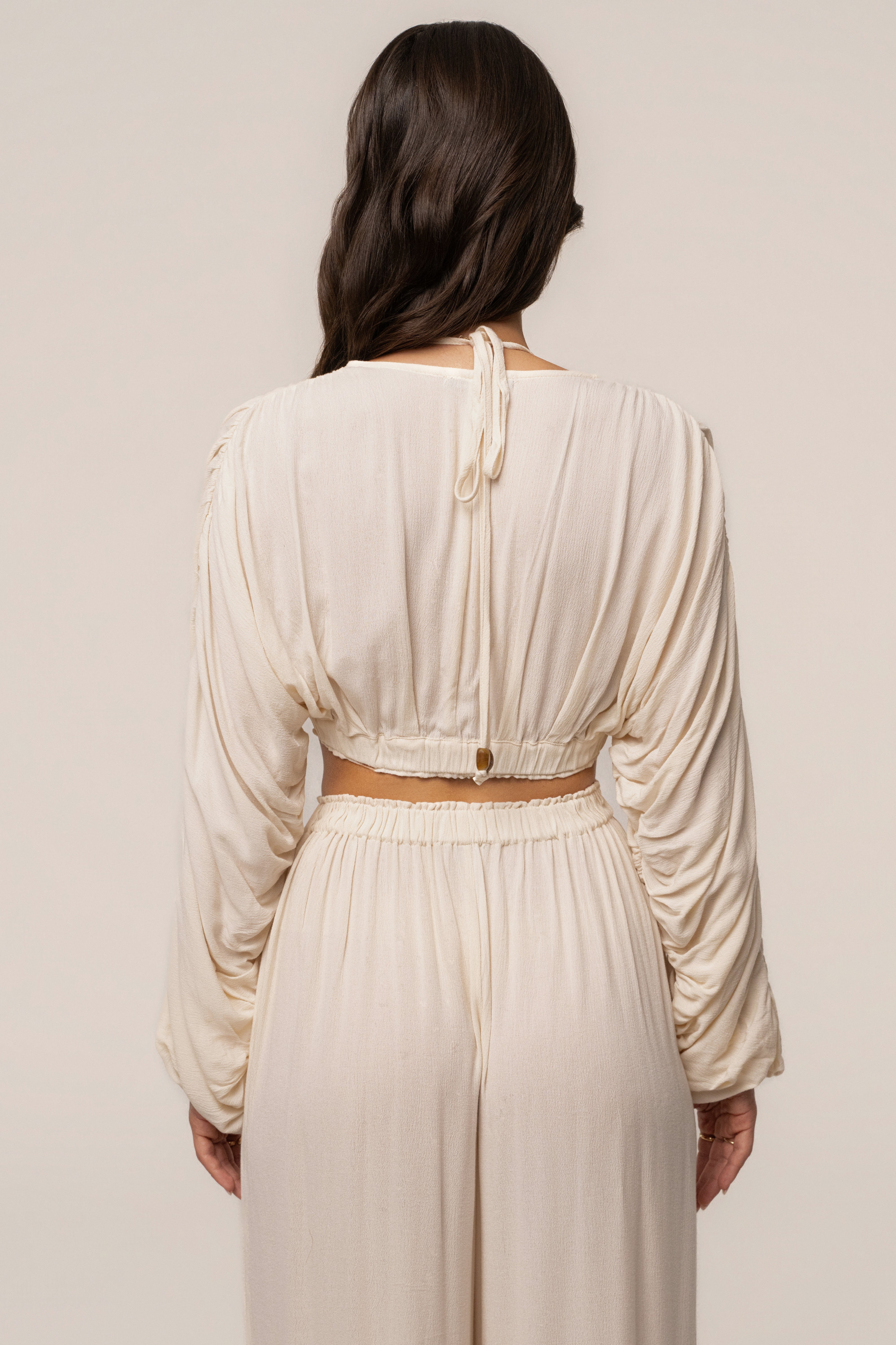 Cream Island Breeze pant set by JLUXLABEL featuring relaxed fit pants and a matching top, perfect for casual wear.