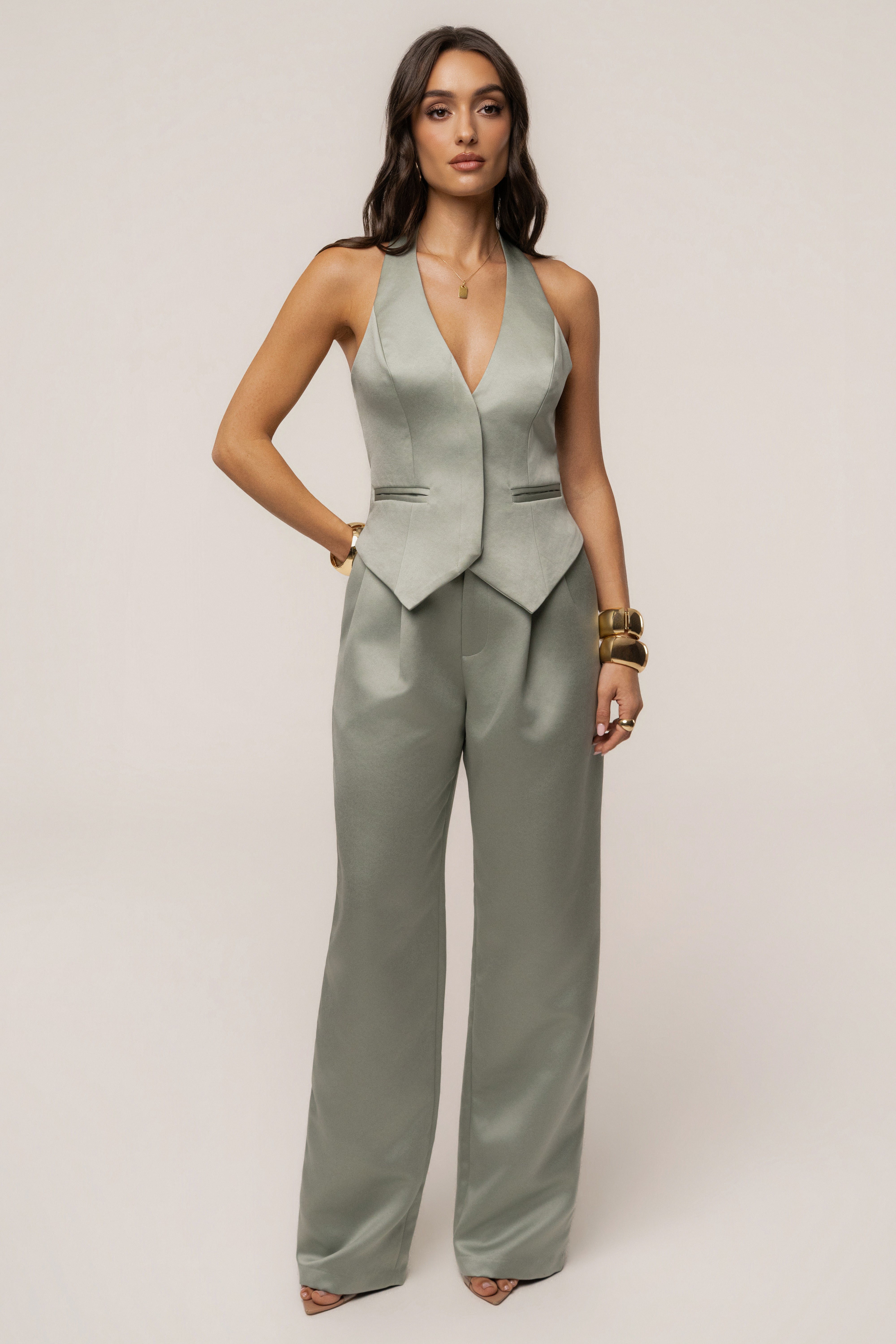 Sage City Nights satin trousers by JLUXLABEL, stylish bottoms with a smooth, shiny fabric and tailored fit.