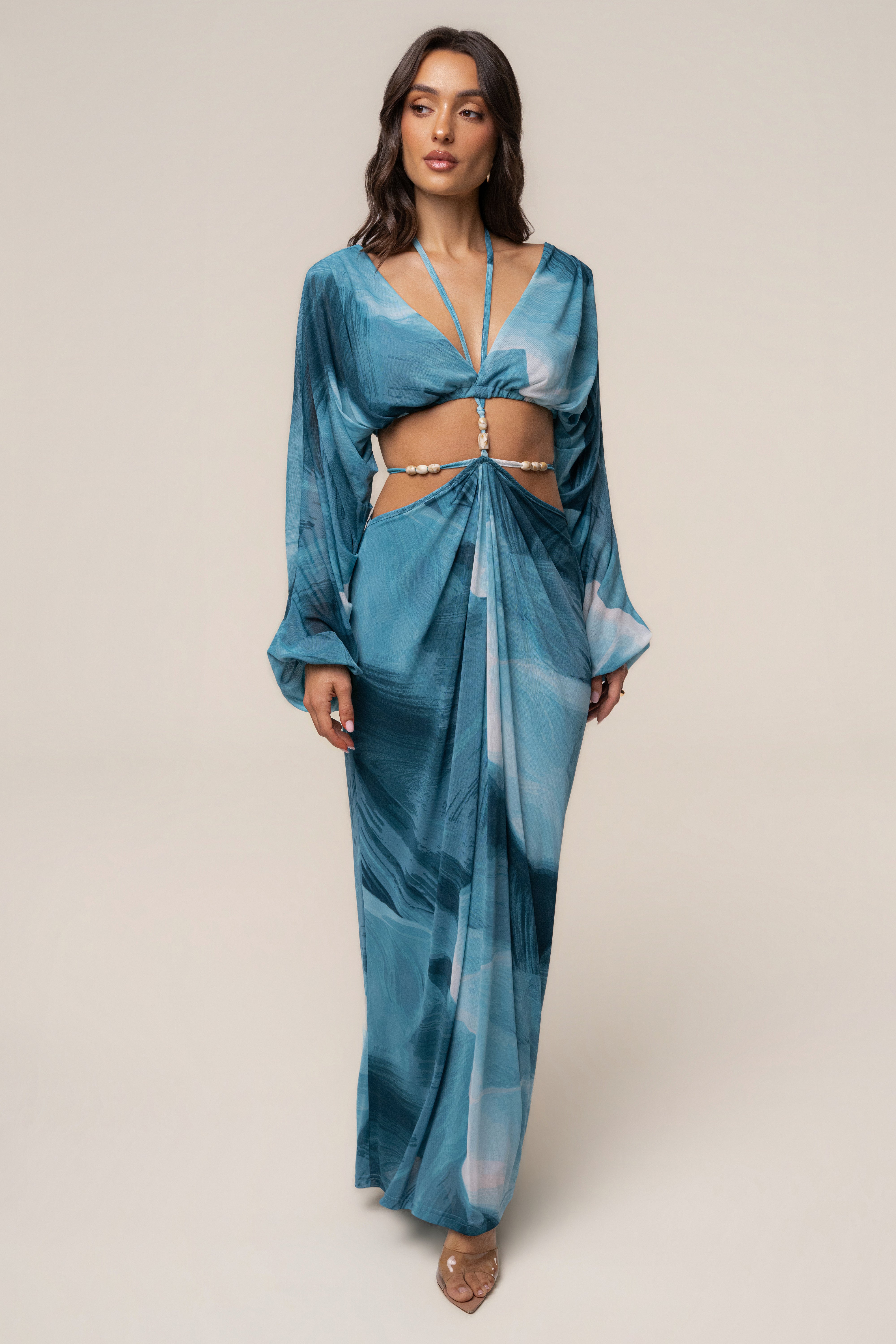 Sunset Blue Hera Draped Maxi Skirt by JLUXLABEL featuring flowing fabric and elegant drape in a vibrant blue color.