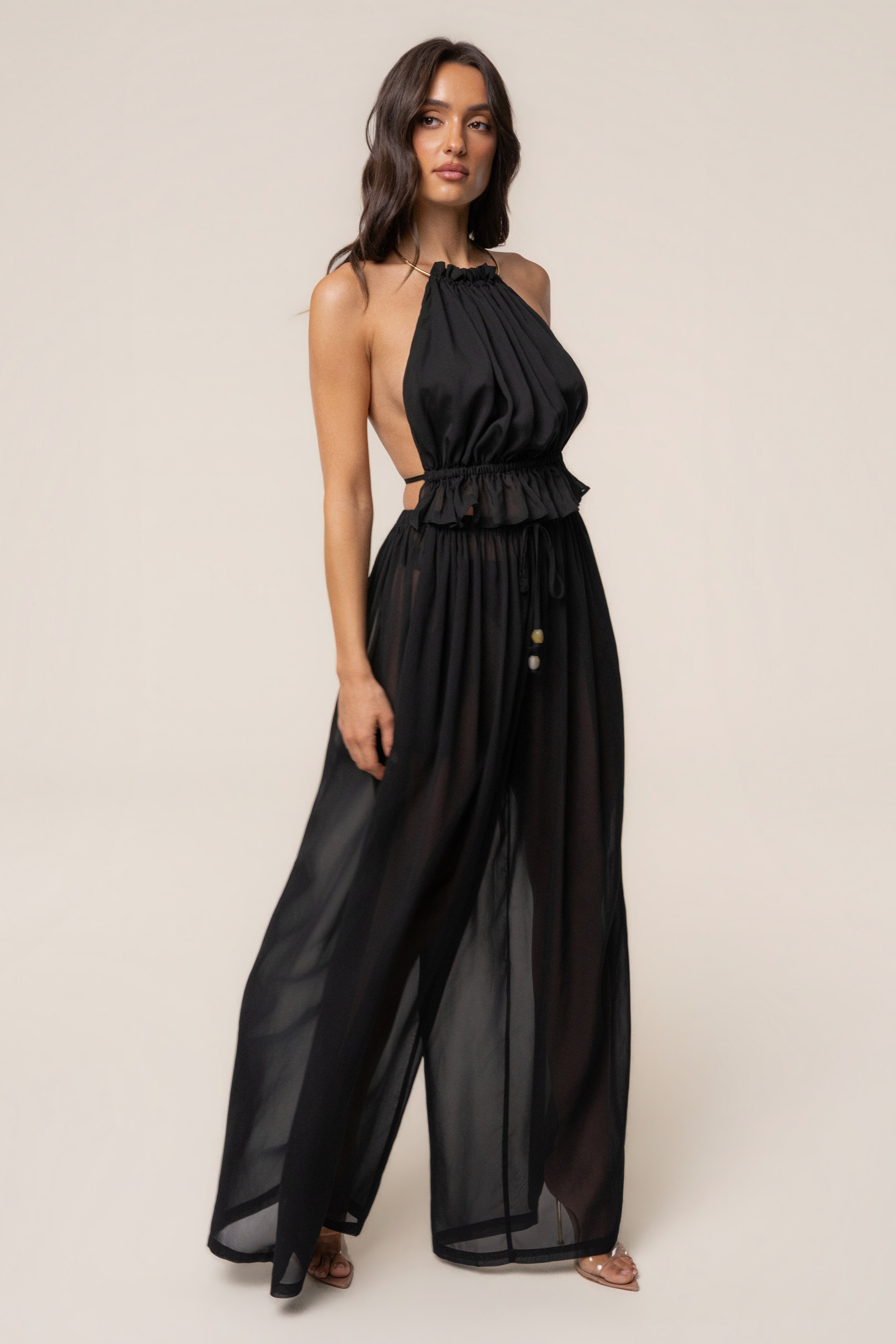 Black Resort Glow chiffon pants by JLUXLABEL, flowy and lightweight bottoms with a relaxed fit and elegant design.