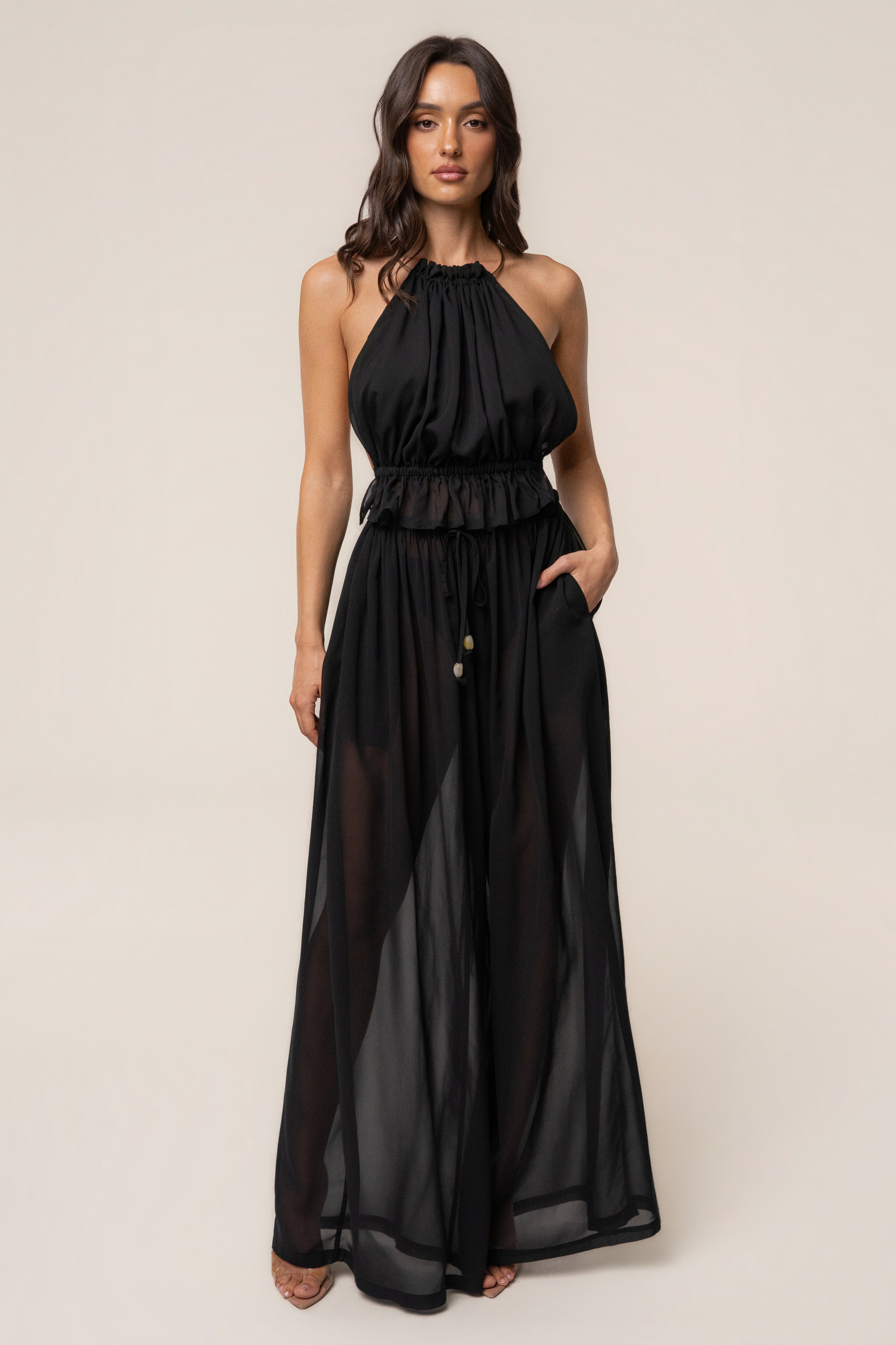 Black JLUXLABEL Resort Glow chiffon pants, flowy and lightweight bottoms with an elegant drape, perfect for resort wear.