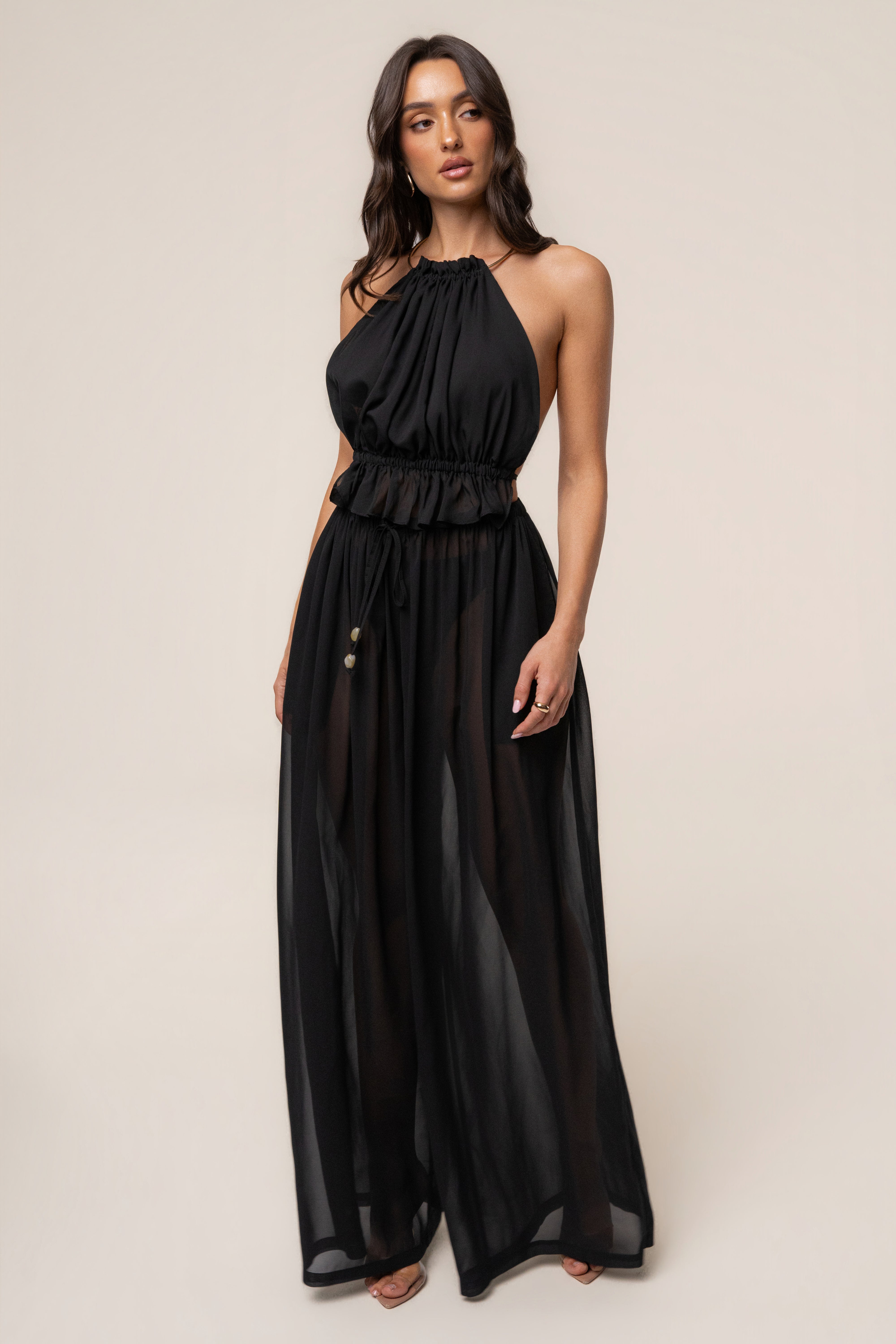 Black chiffon resort glow bottoms from JLUXLABEL, featuring flowy fabric and relaxed fit for stylish beach or casual wear.