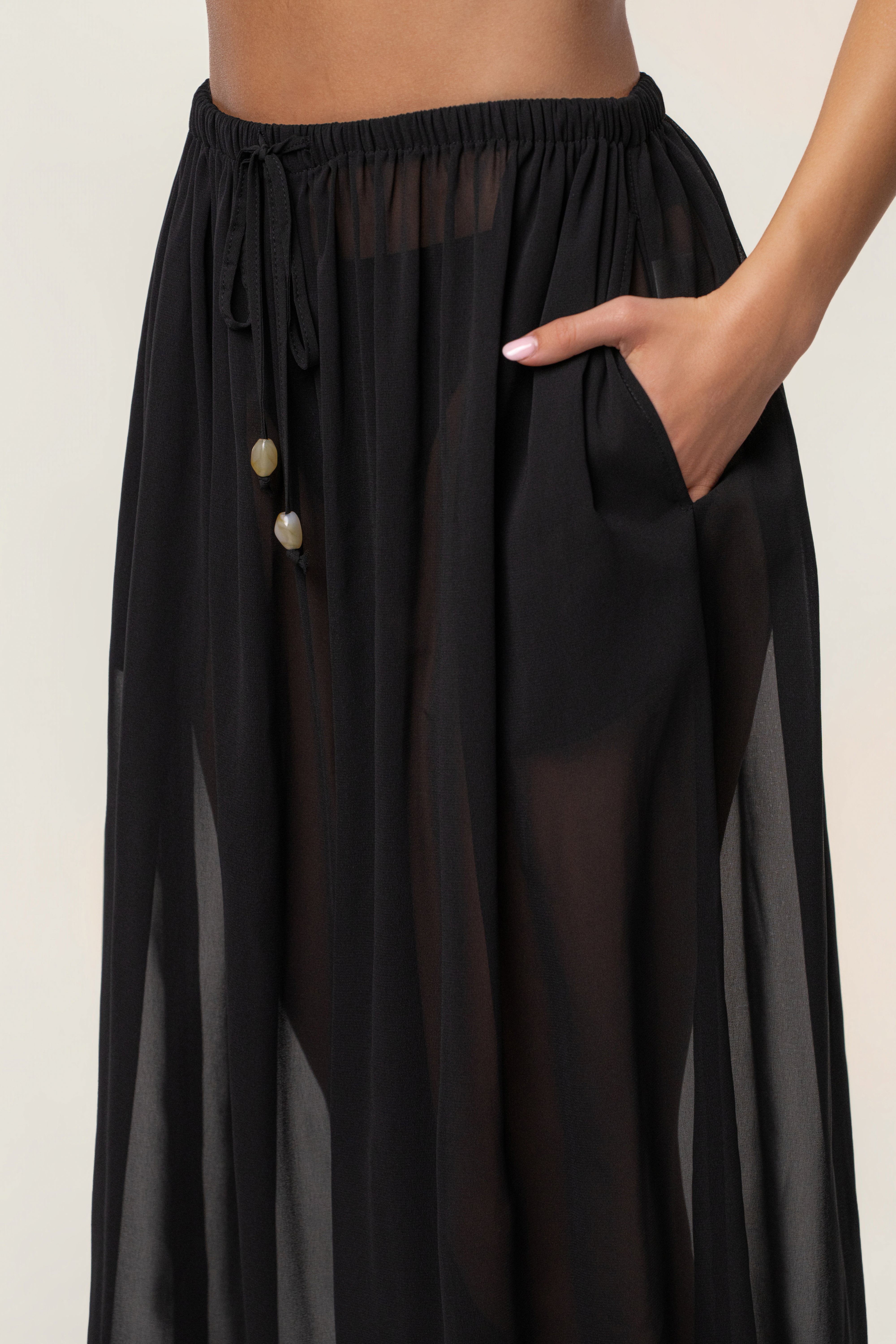Black JLUXLABEL Resort Glow chiffon pant showing flowy fabric and relaxed fit, perfect for stylish resort or casual wear.