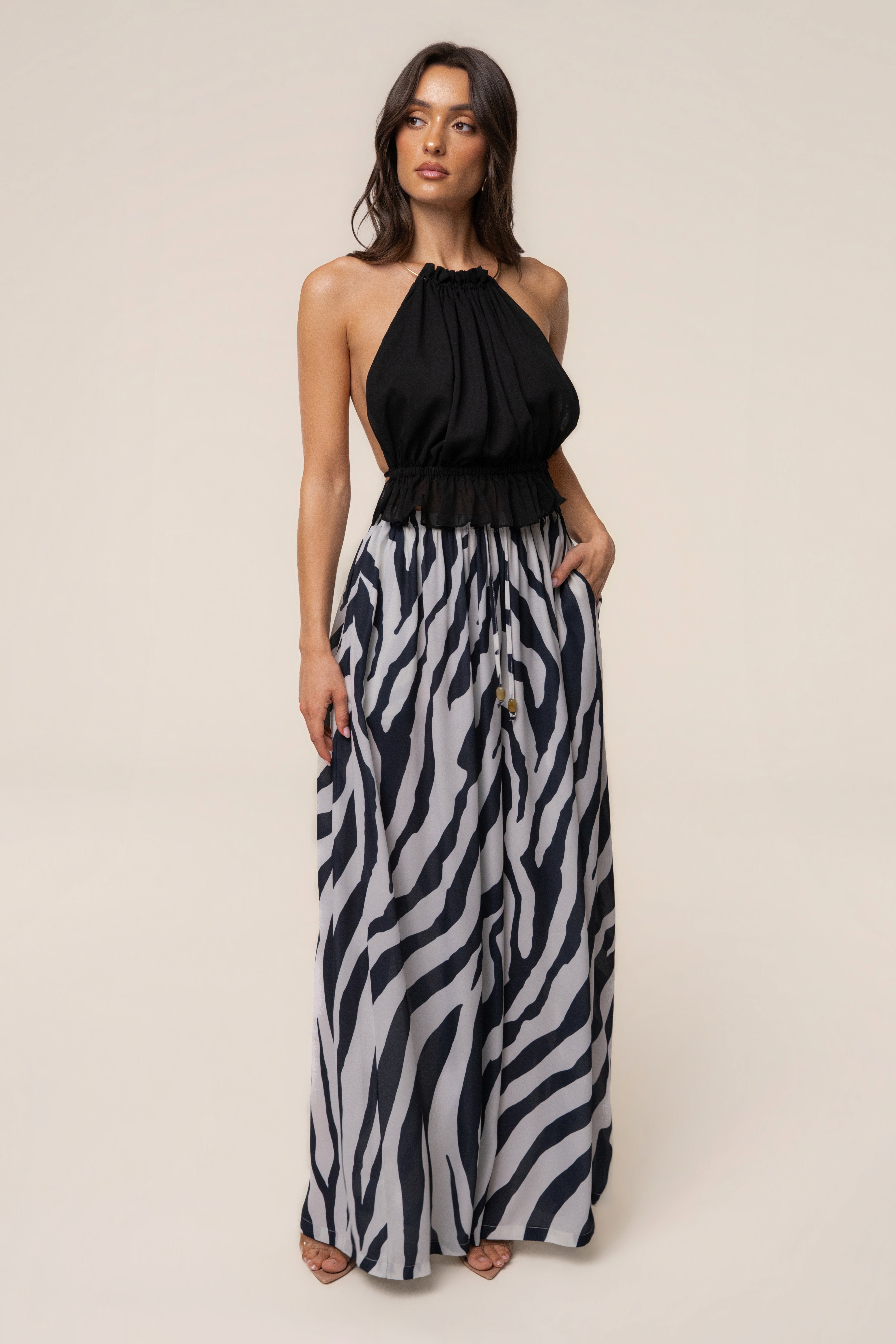 Navy zebra print chiffon resort glow pant by JLUXLABEL, flowing wide-leg bottoms with a relaxed fit and stylish pattern.