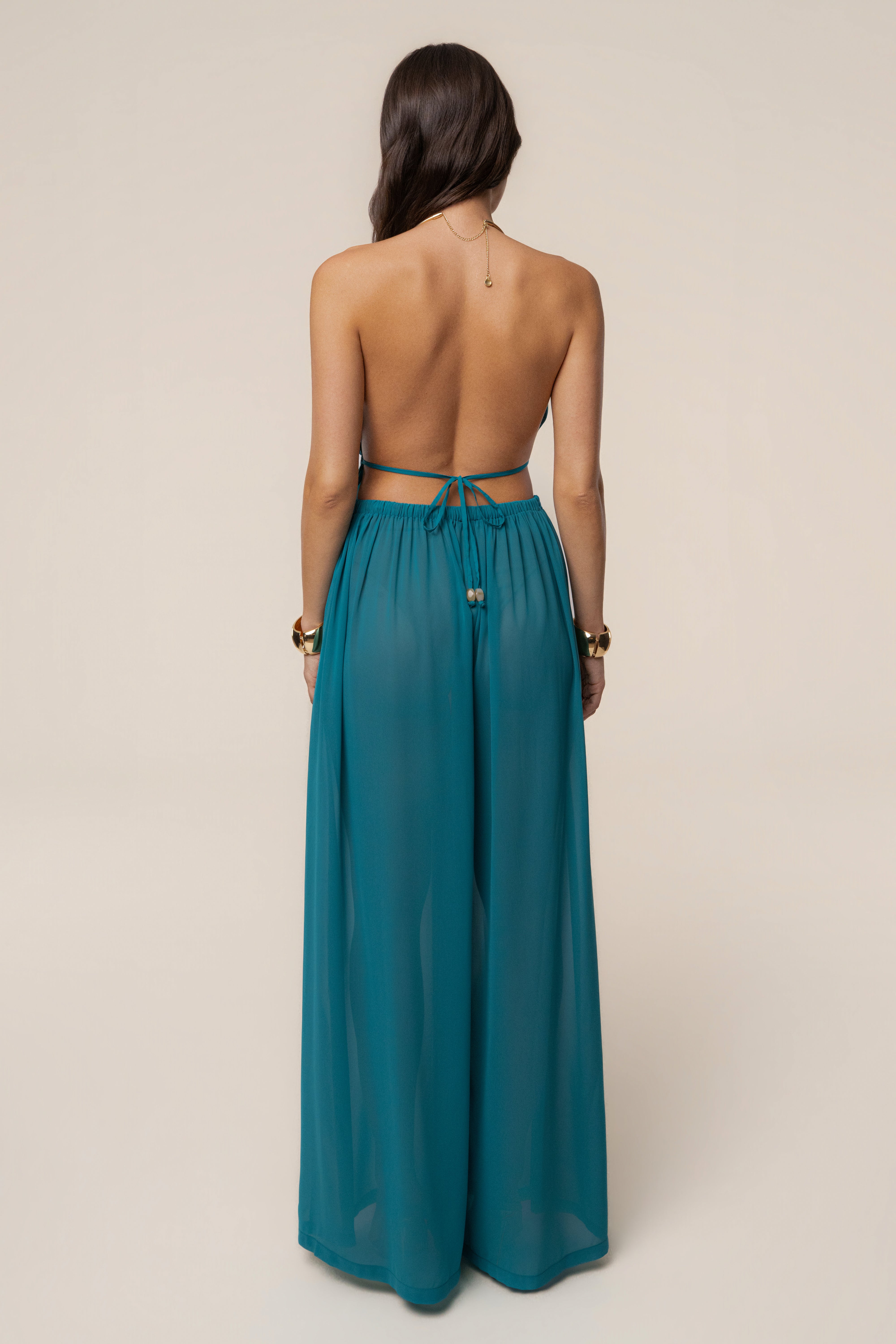 JLUXLABEL Aqua Resort Glow chiffon pant featuring lightweight, flowy fabric and vibrant blue color for stylish beach or resort wear.