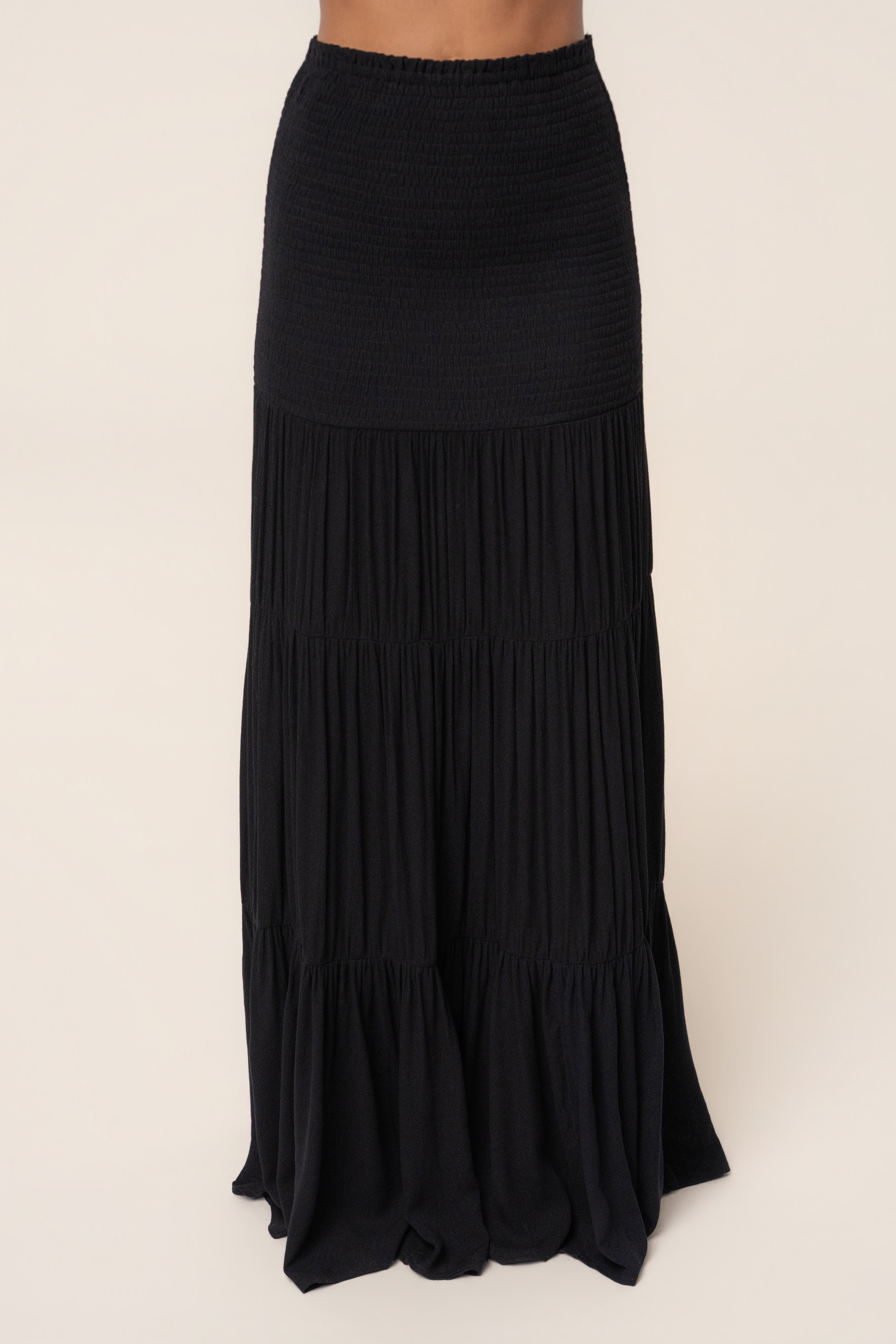 Black Solana Skirt Set by JLUXLABEL featuring a stylish matching top and skirt ensemble for a chic look.