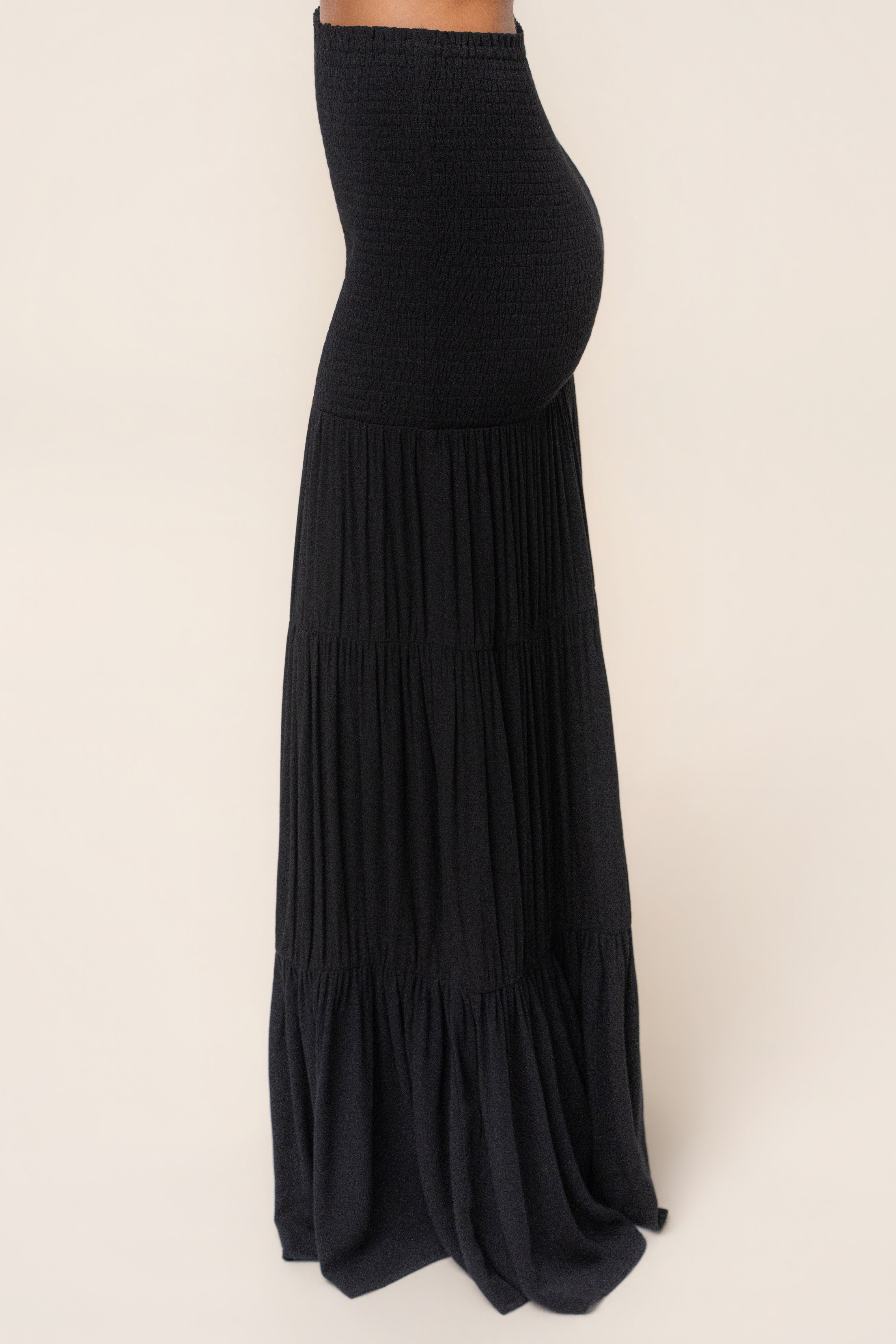 Black Solana skirt set by JLUXLABEL featuring a fitted skirt and matching top, styled together for a chic, coordinated look.