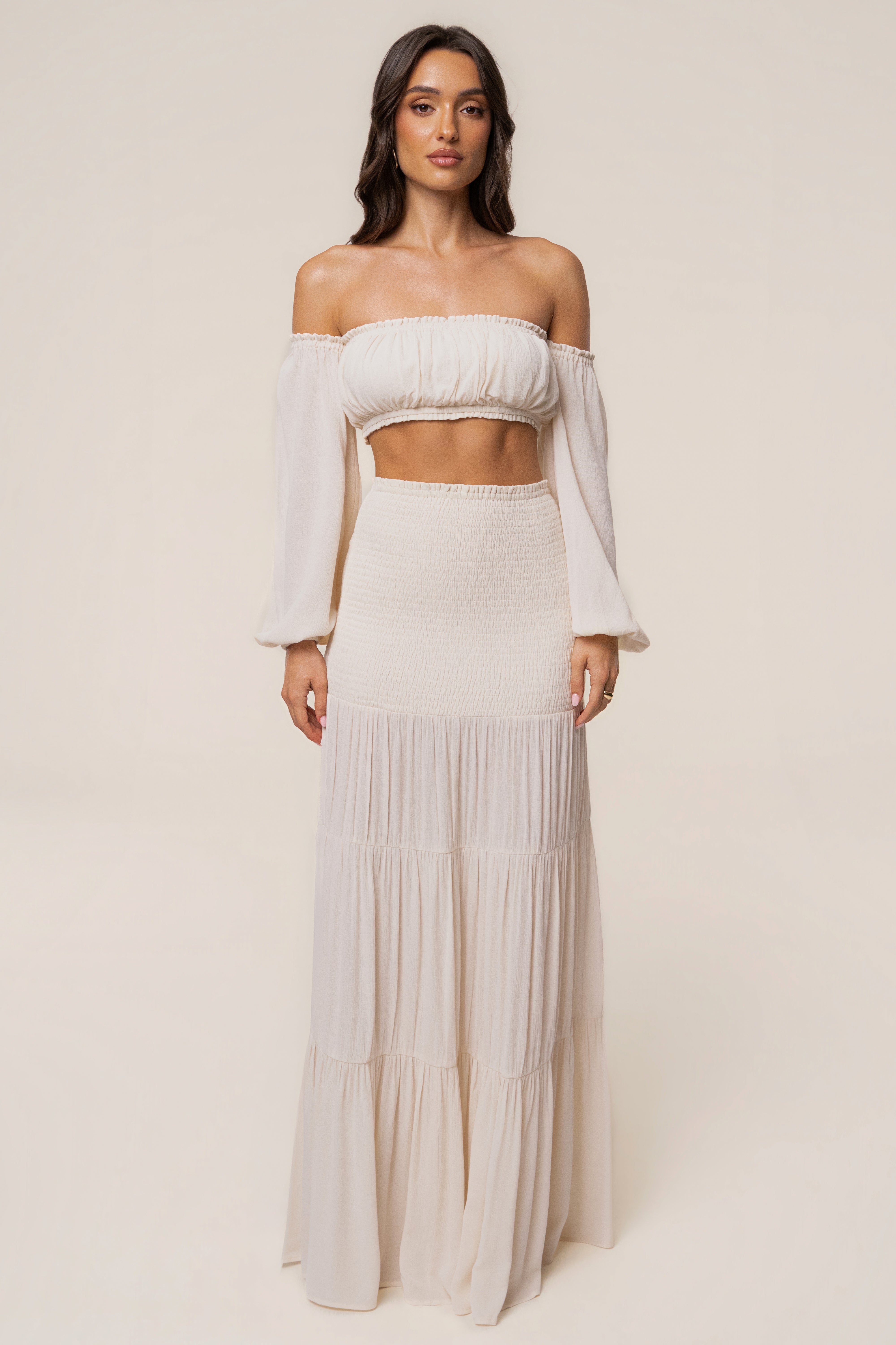 Ivory Solana skirt set by JLUXLABEL featuring a stylish coordinated top and skirt ensemble.