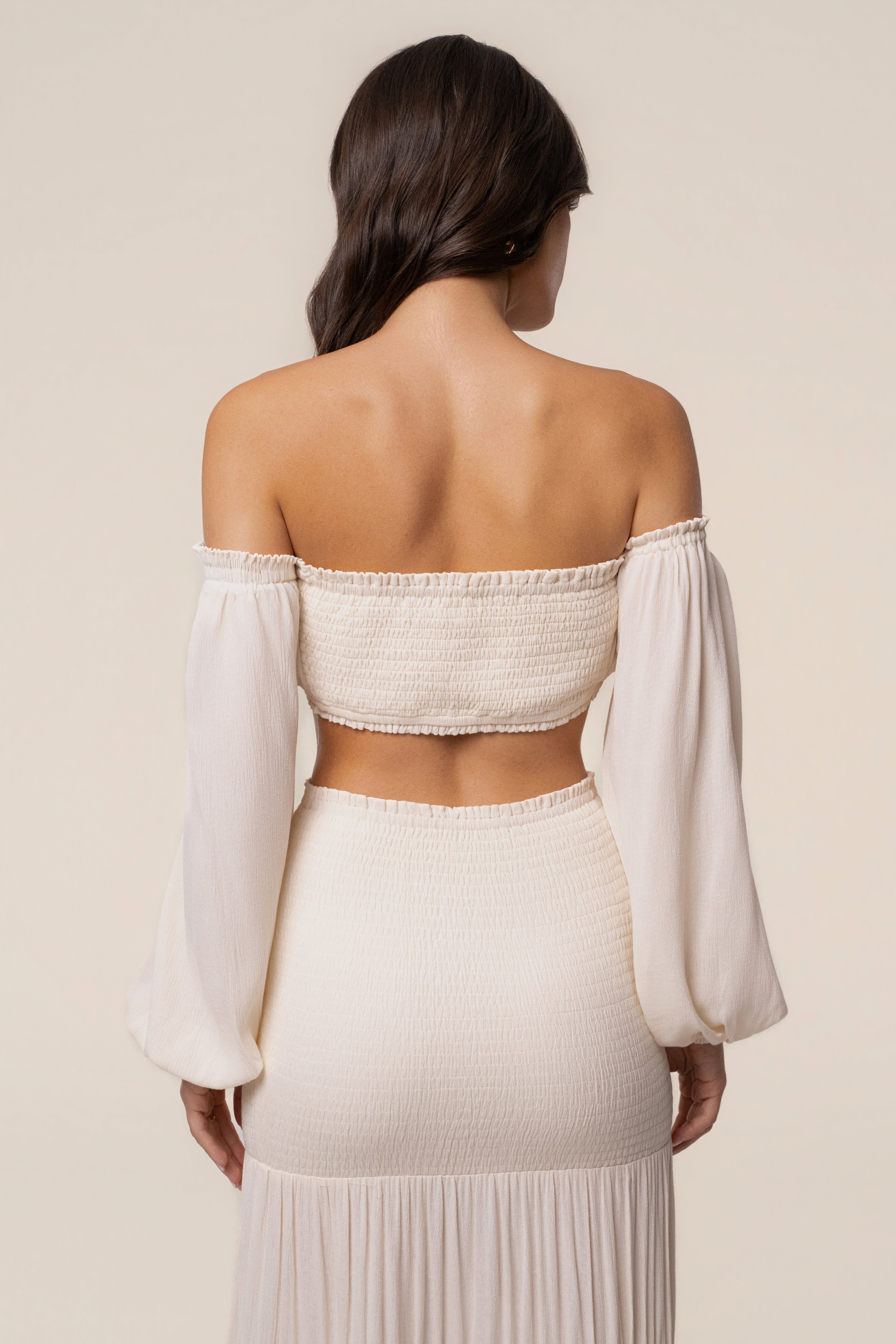 Ivory Solana skirt set by JLUXLABEL featuring a matching top and skirt with a sleek, stylish design.