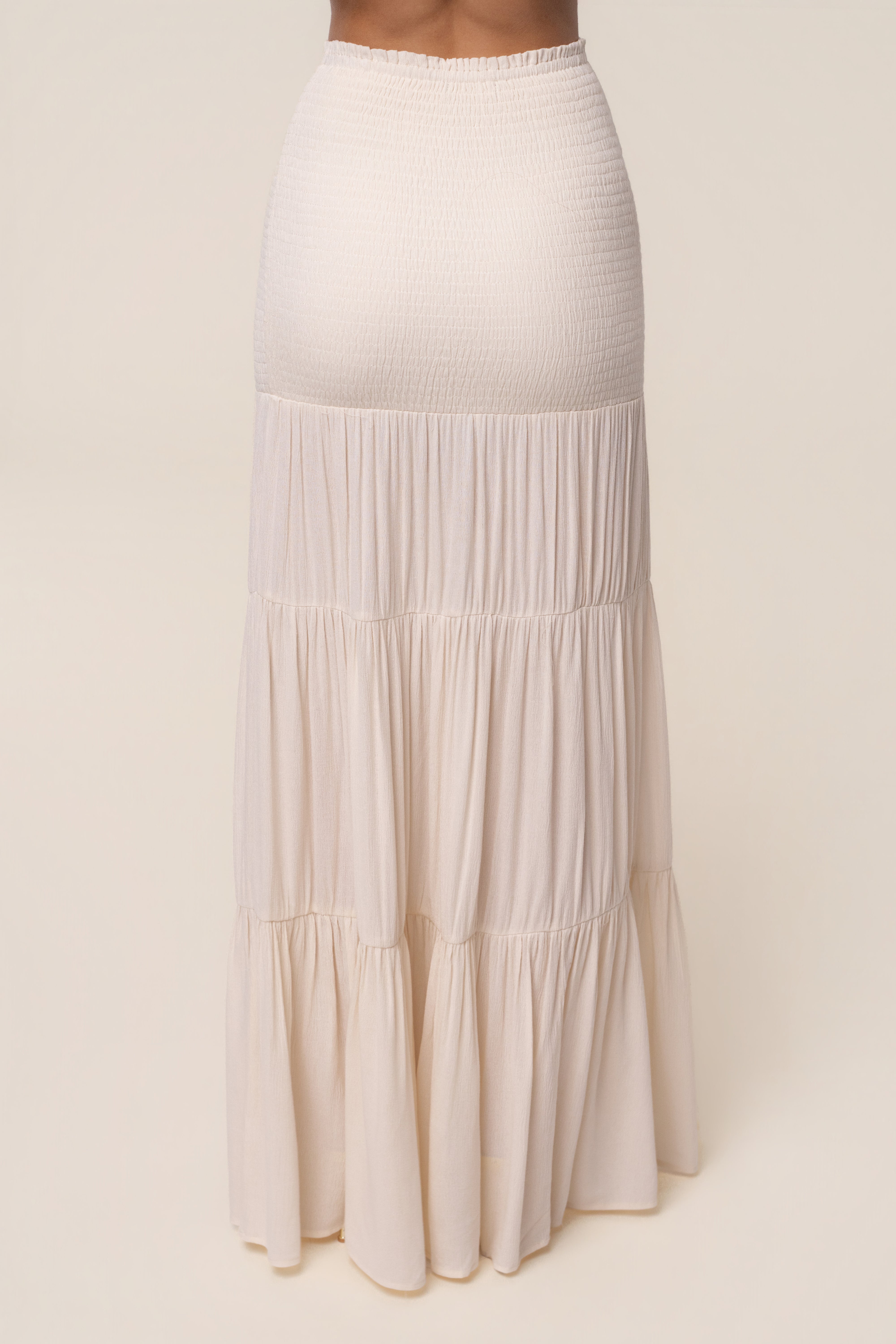 Ivory Solana Skirt Set by JLUXLABEL featuring a stylish matching top and skirt in a soft, elegant fabric.