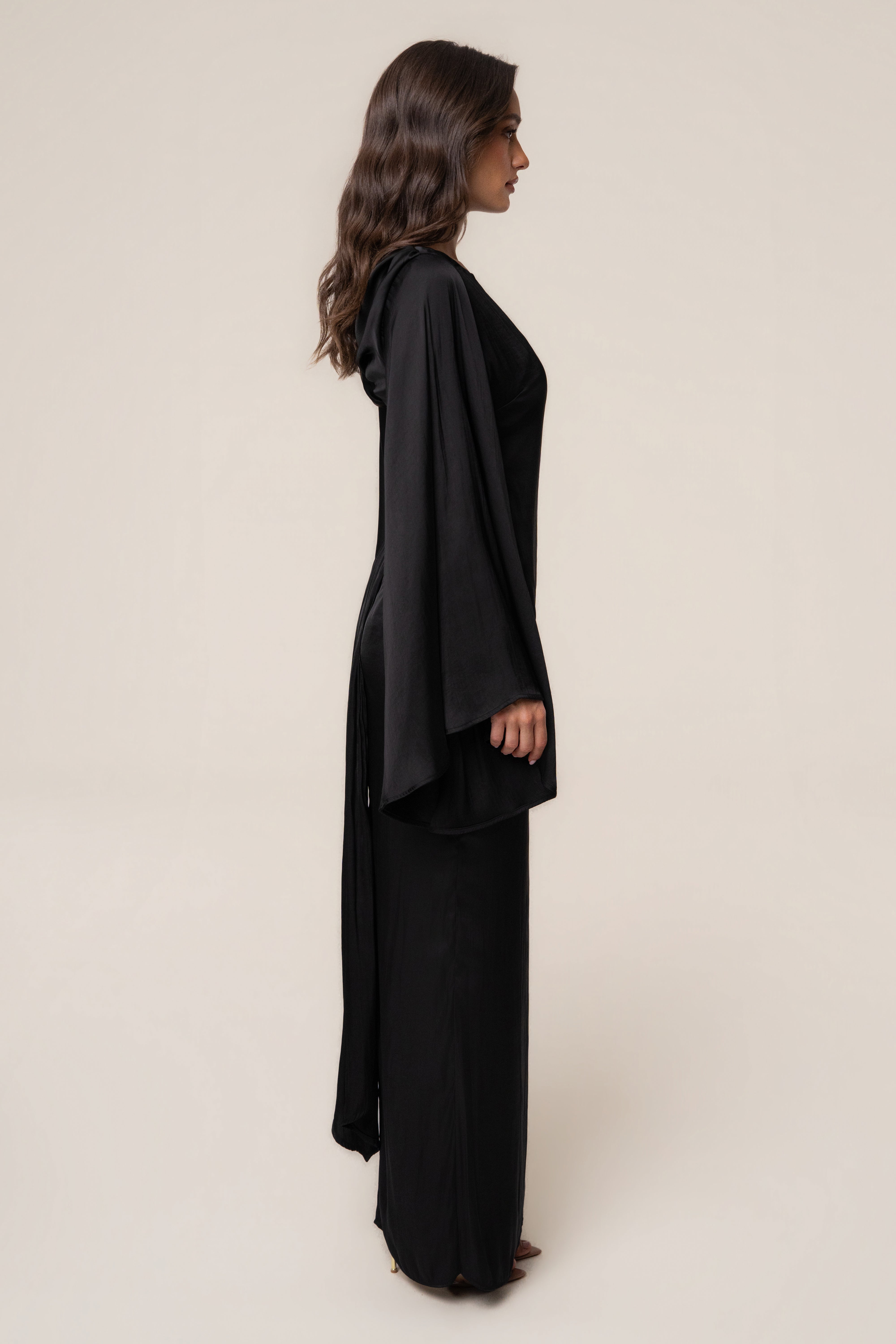 Black soft fabric maxi dress by JLUXLABEL featuring a flowing silhouette and elegant design.