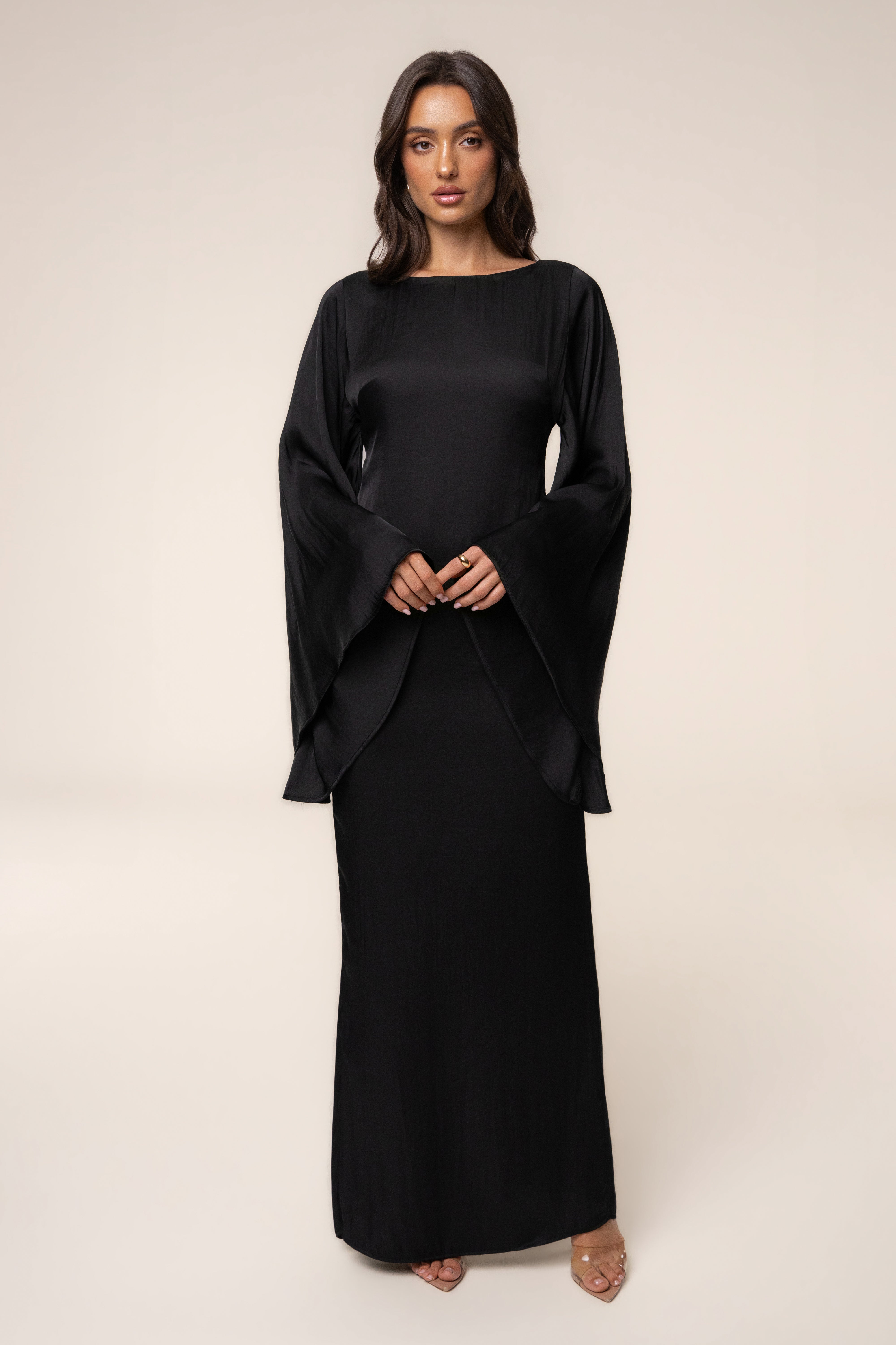 Black soft maxi dress from JLUXLABEL featuring a flowy silhouette, sleeveless design, and elegant length.