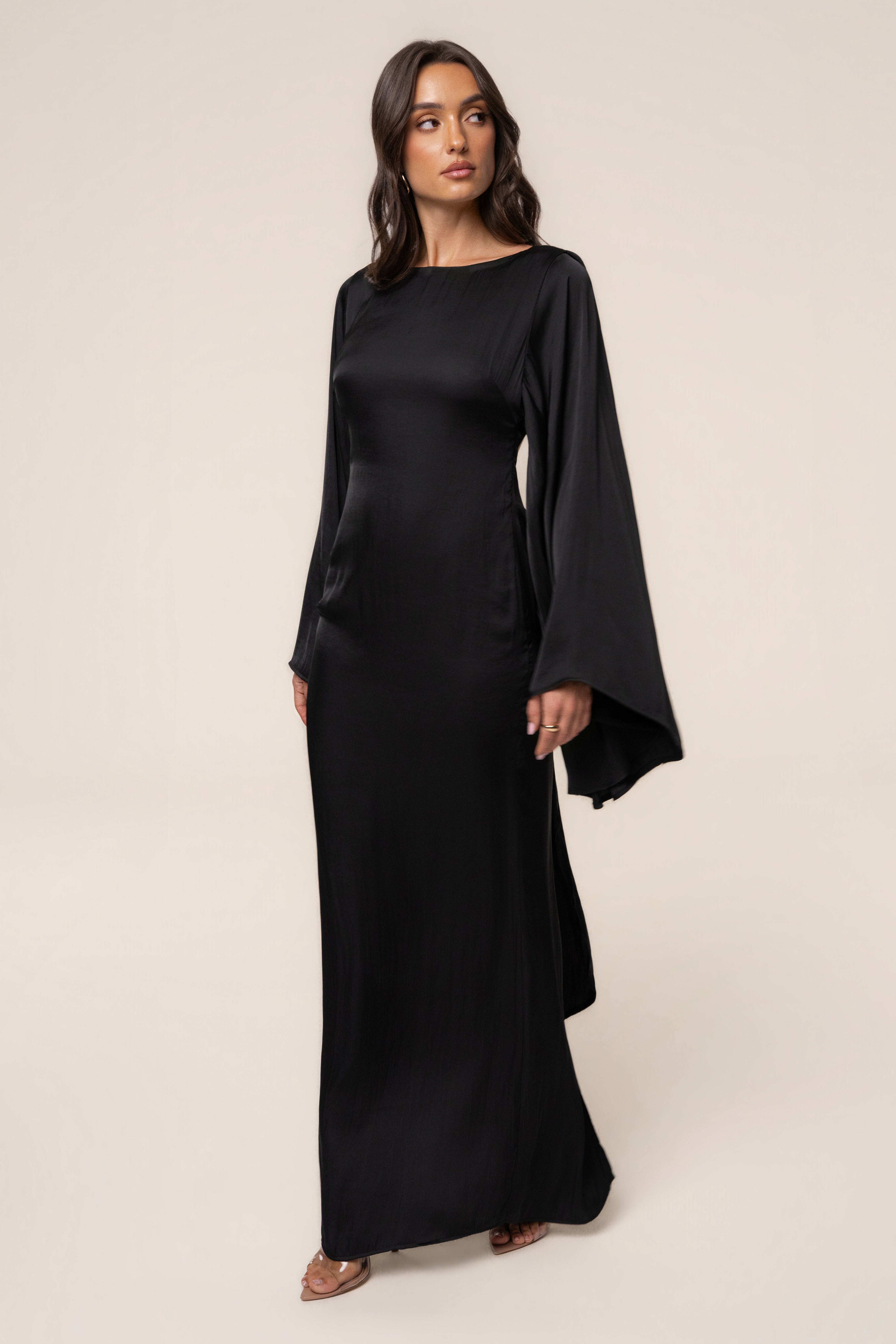 Black soft fabric maxi dress from JLUXLABEL featuring a flowing silhouette and elegant design.