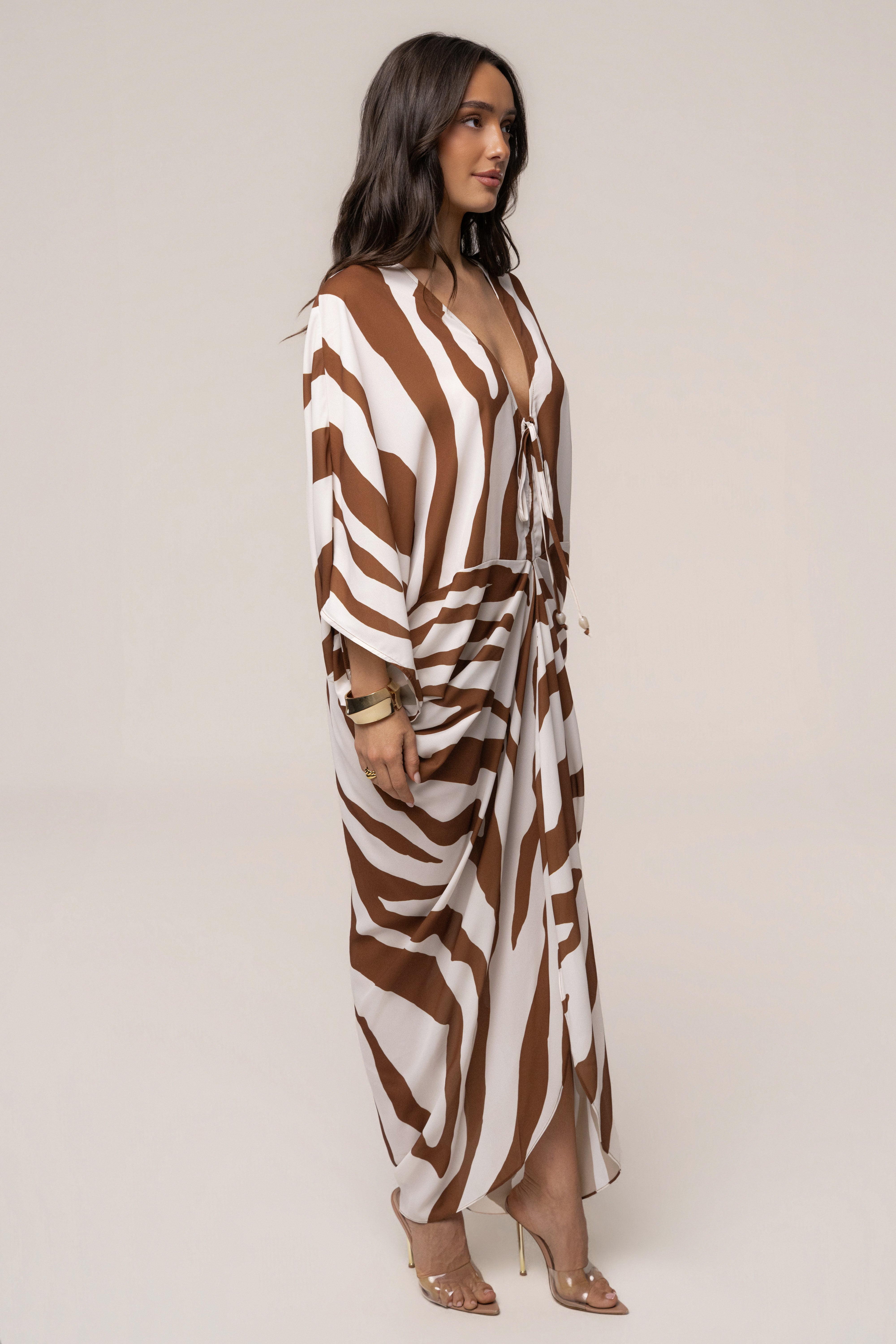 Brown Zebra Longer Days Cover Up Dress by JLUXLABEL, featuring a flowing fabric and zebra print pattern, perfect for beachwear.