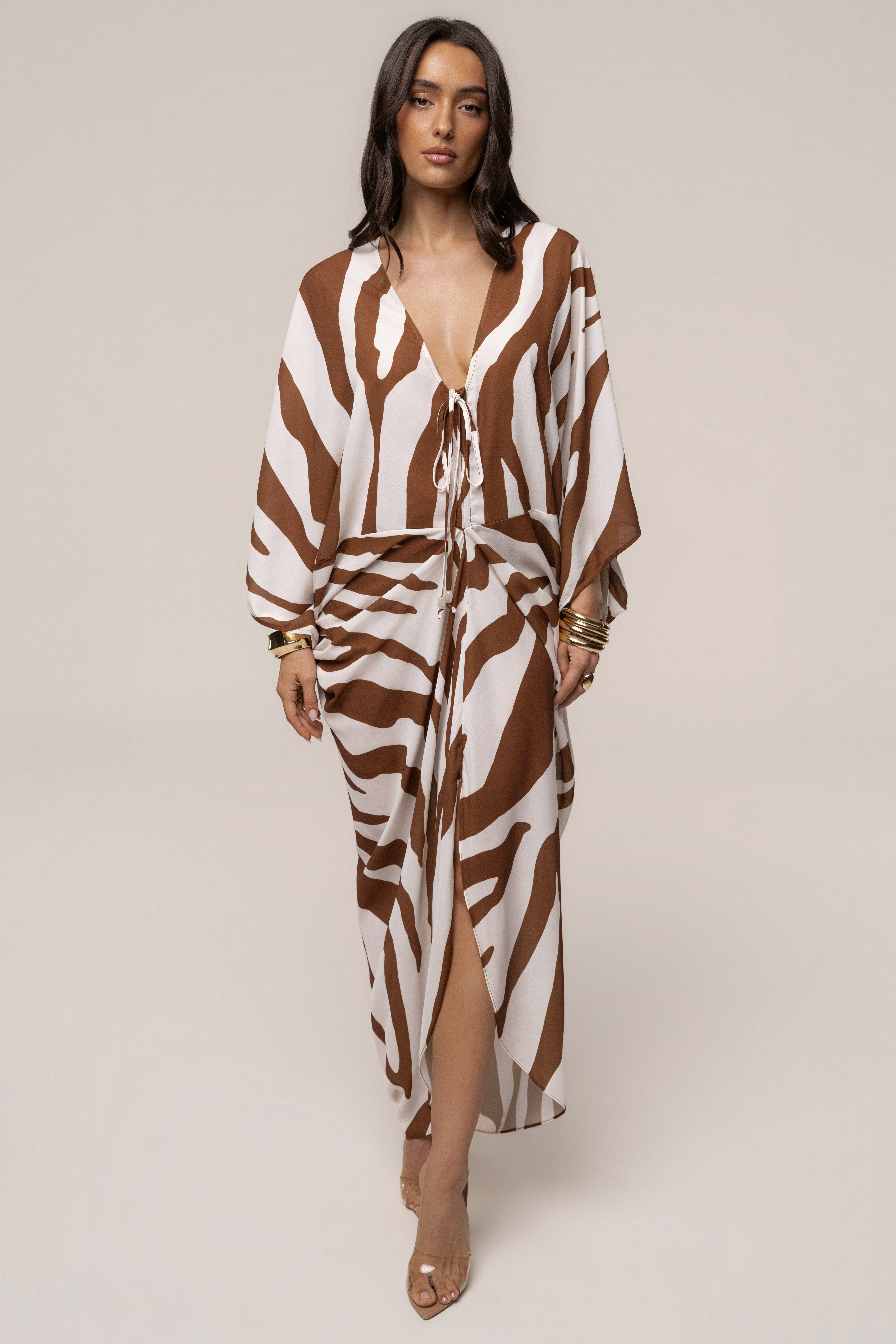Brown zebra print cover-up dress by JLUXLABEL, featuring a flowy design and long sleeves, perfect for beach or casual wear.